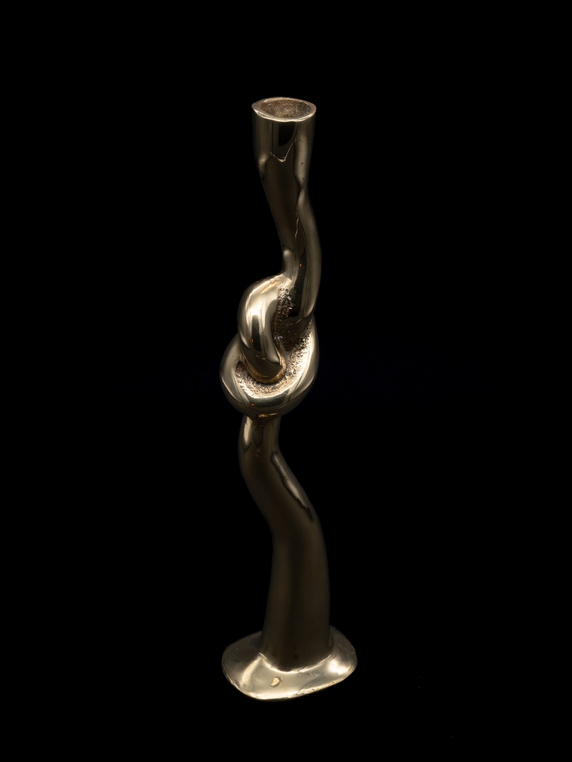 Fluid Knot Candlestick, Spain, c 1970s — side angle showing polished brass finish