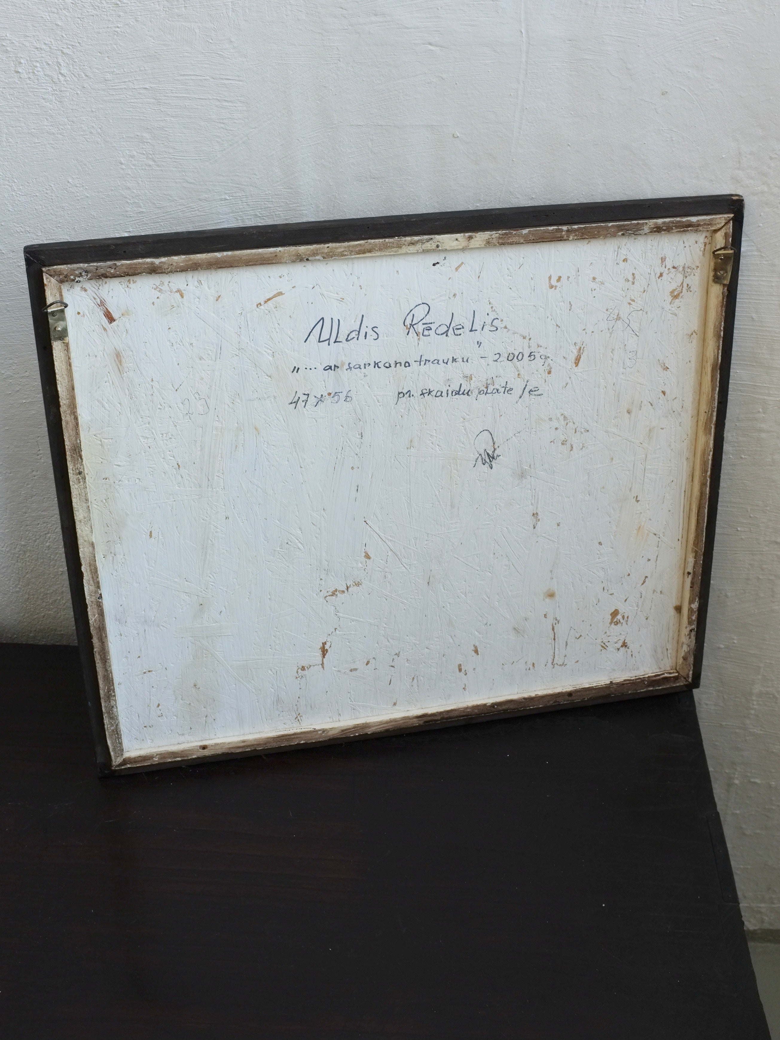 Uldis Rēdelis Still Life Painting "With Red Vessel" | Latvia | 2005 — back view showing wooden frame and signature