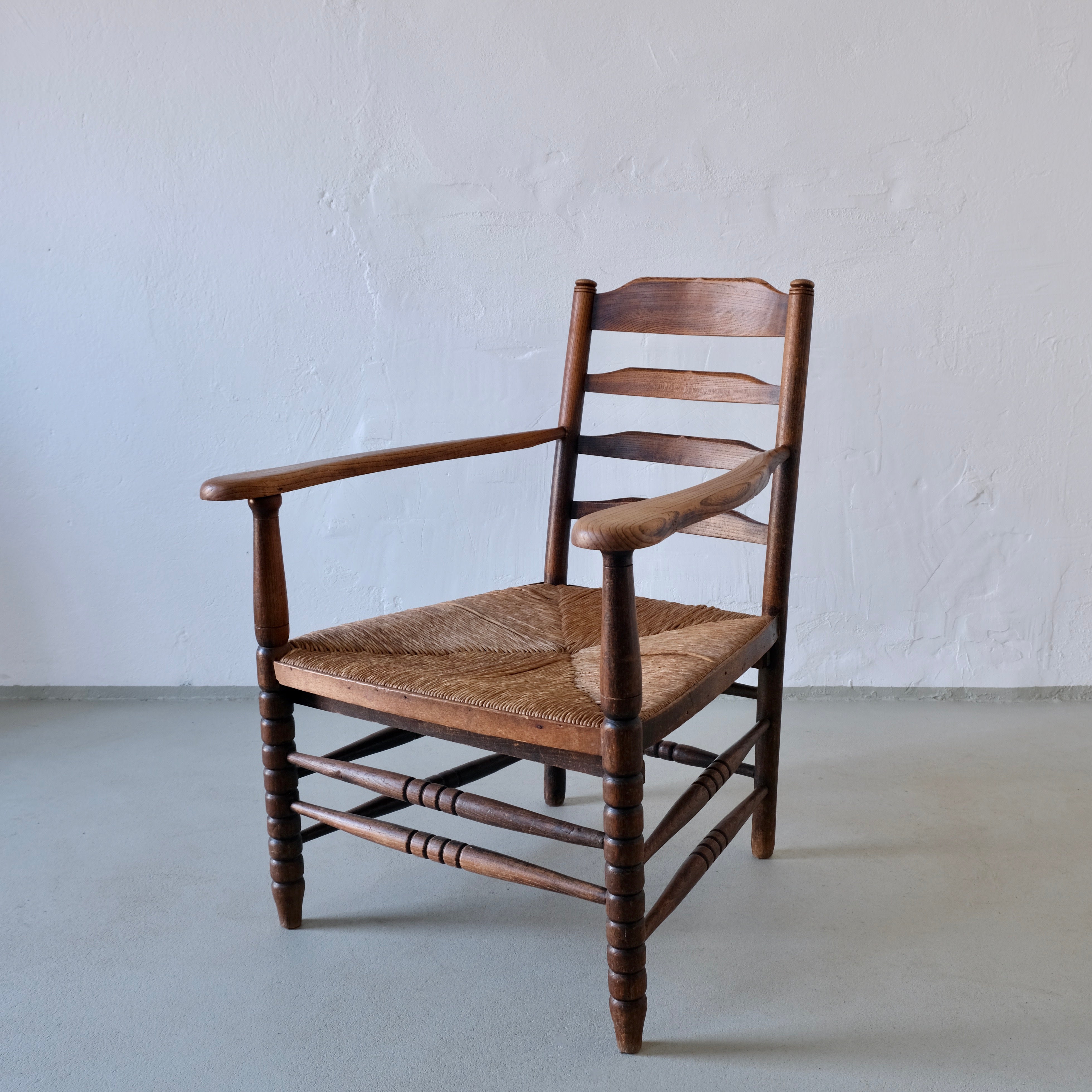 Rustic Bobbin Rush Seat Low Armchair | Netherlands | 1940s by Veter Vintage | The Oblist