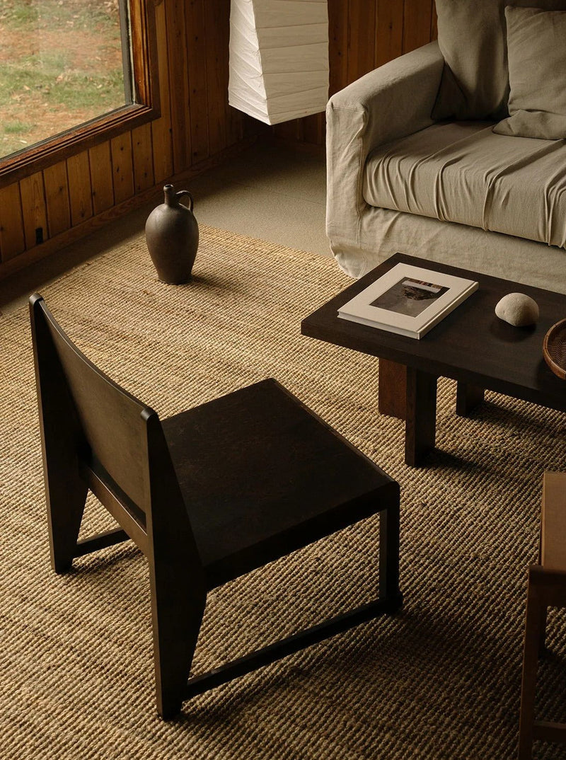 Easy Chair 01 | Dark Brown Birch — angled view in cozy living room setting