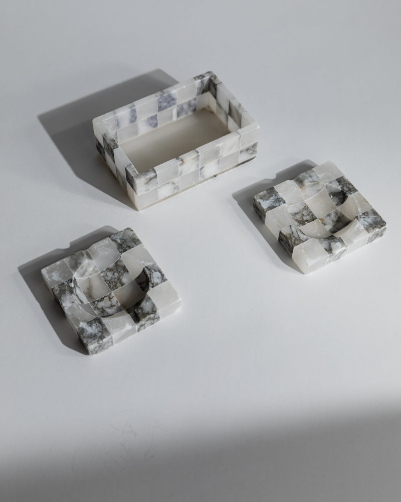 1970s marble smoking set with rectangular ashtray and two square ashtrays