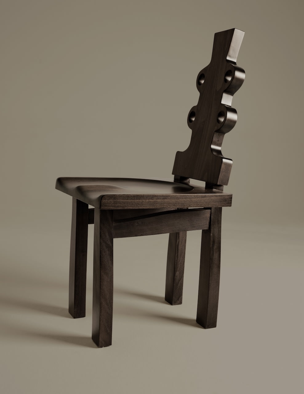 Ewa Chair — side angle showing dark wood finish and unique backrest