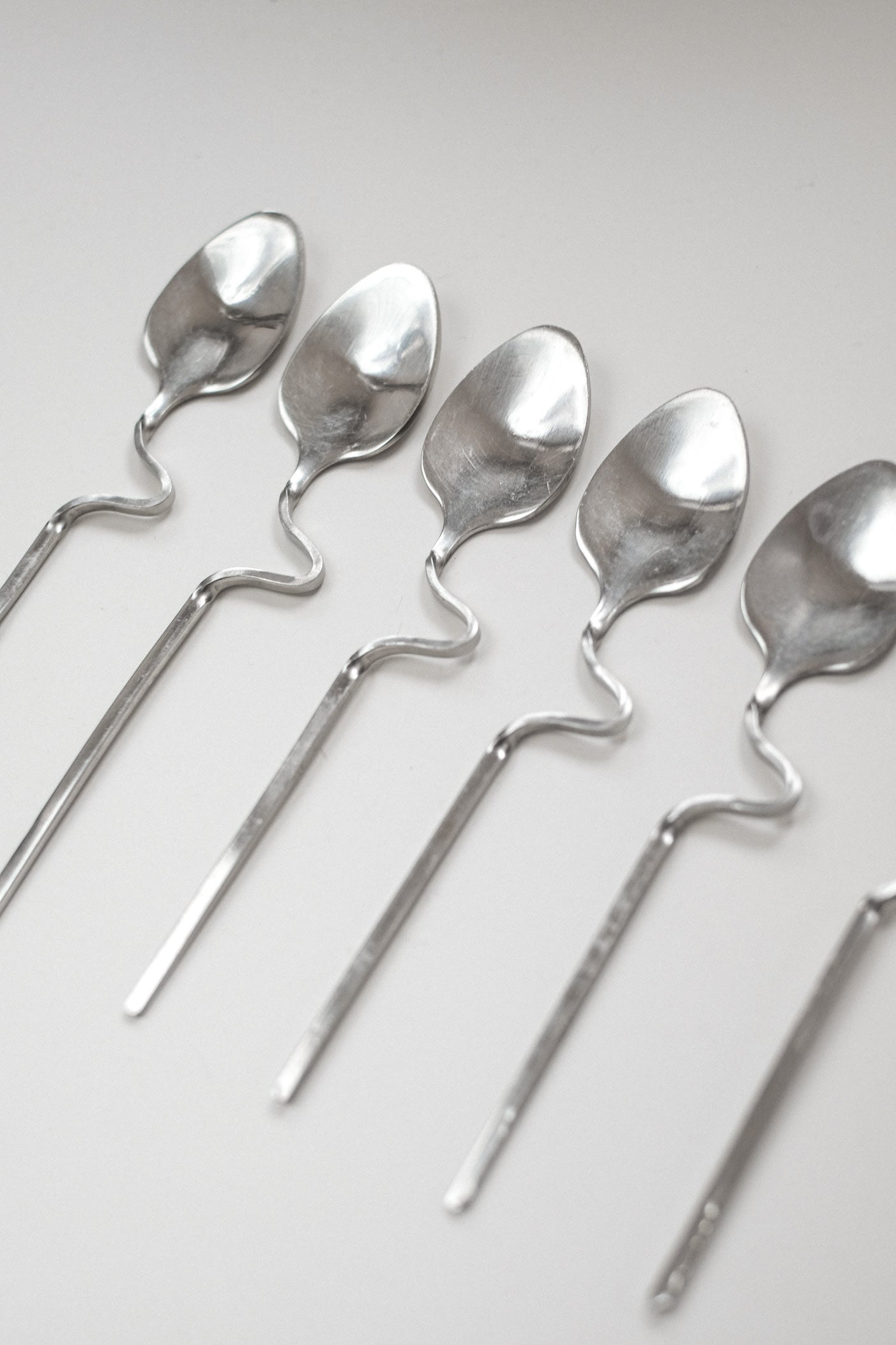 Zigzag Cutlery Set — side angle of handcrafted silver spoons