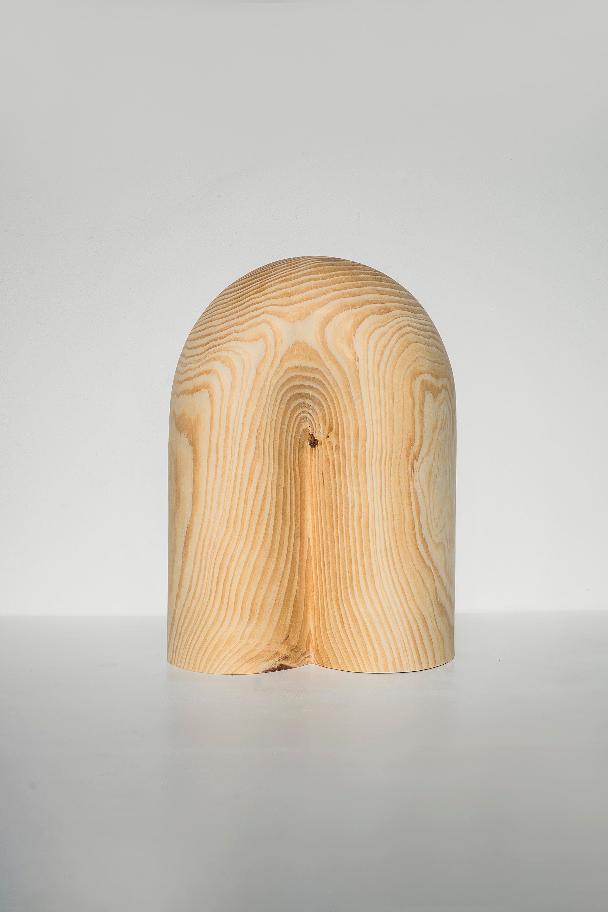 Sculptures — front view of natural wood arch design
