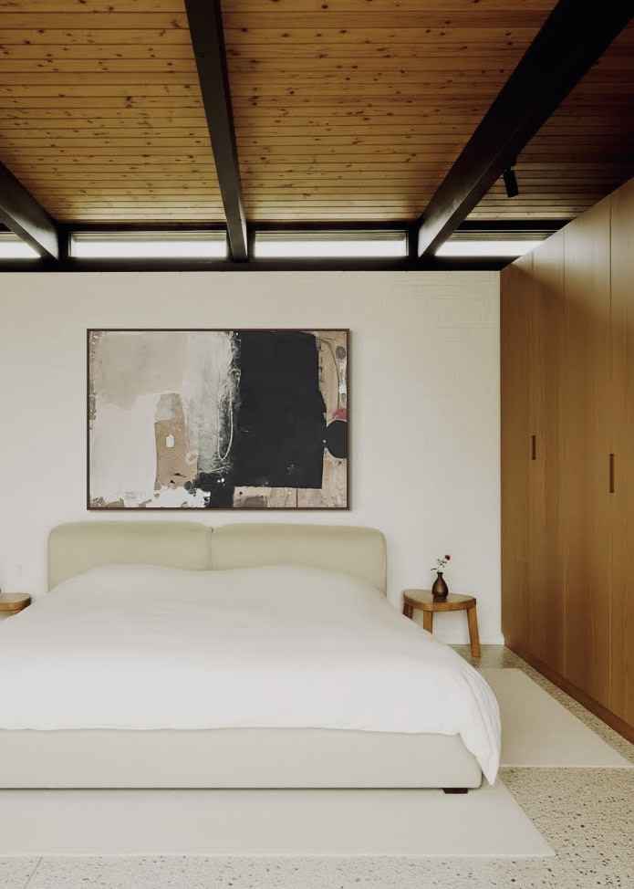 Sand and Ink, Abstract on Raw Canvas — side view above modern bed