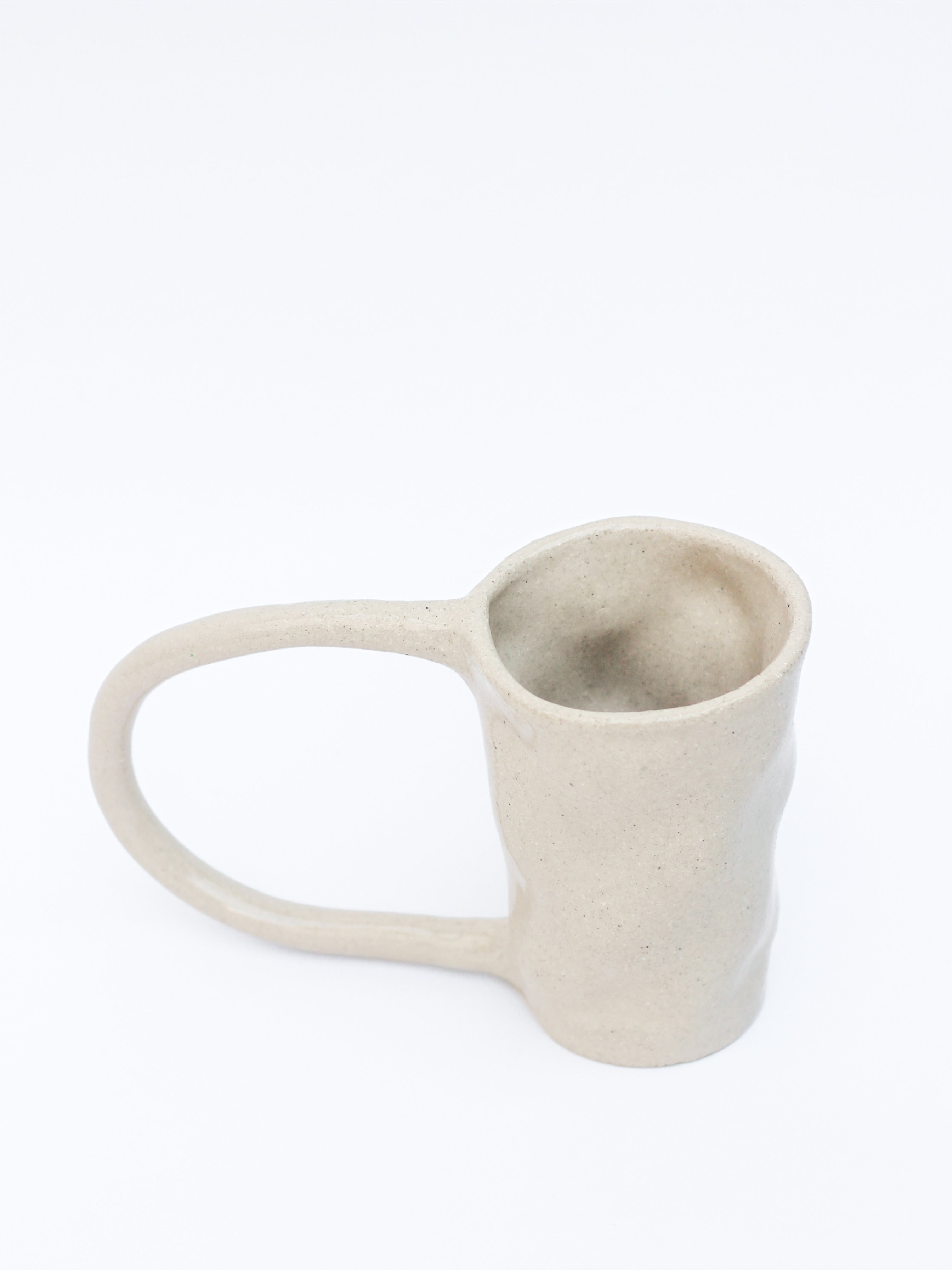 Large Stoneware Coffee Mug — angled view highlighting textured surface