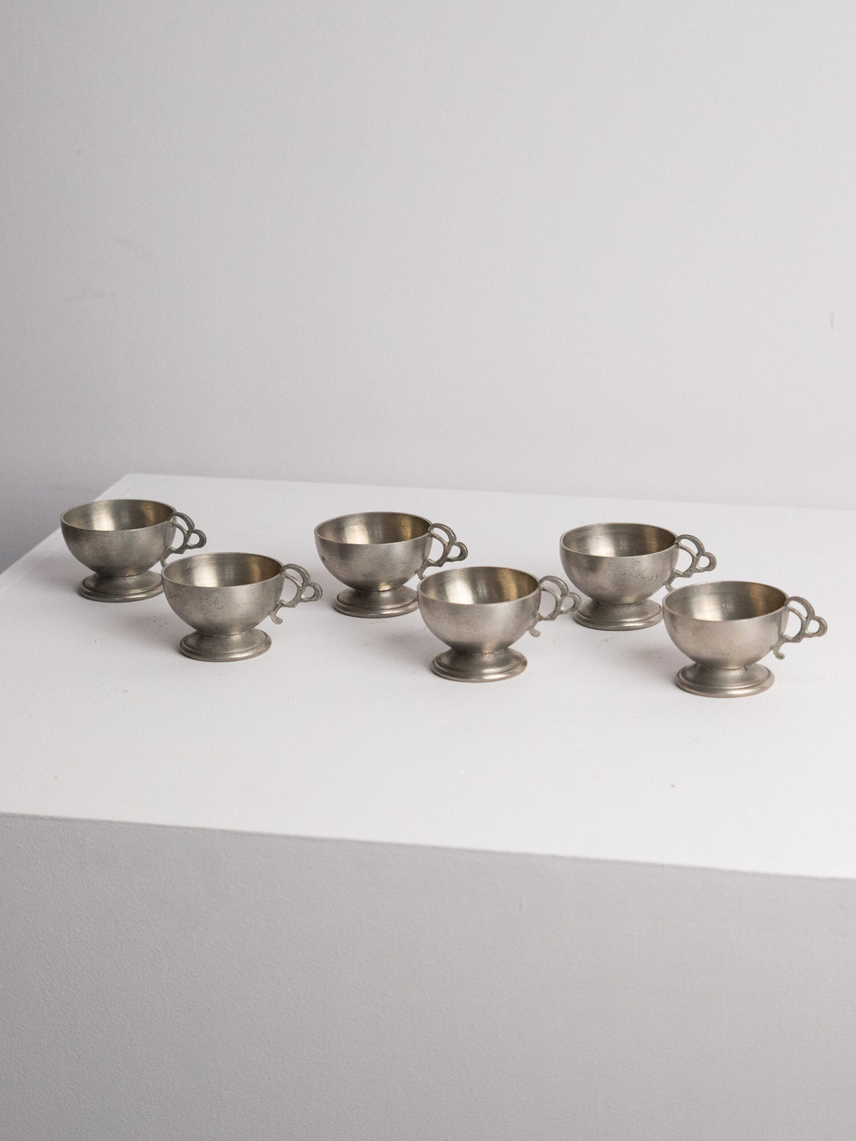 Six Footed Pewter Punch Cups, Triple-Loop Handles, Sweden 1977 — side angle