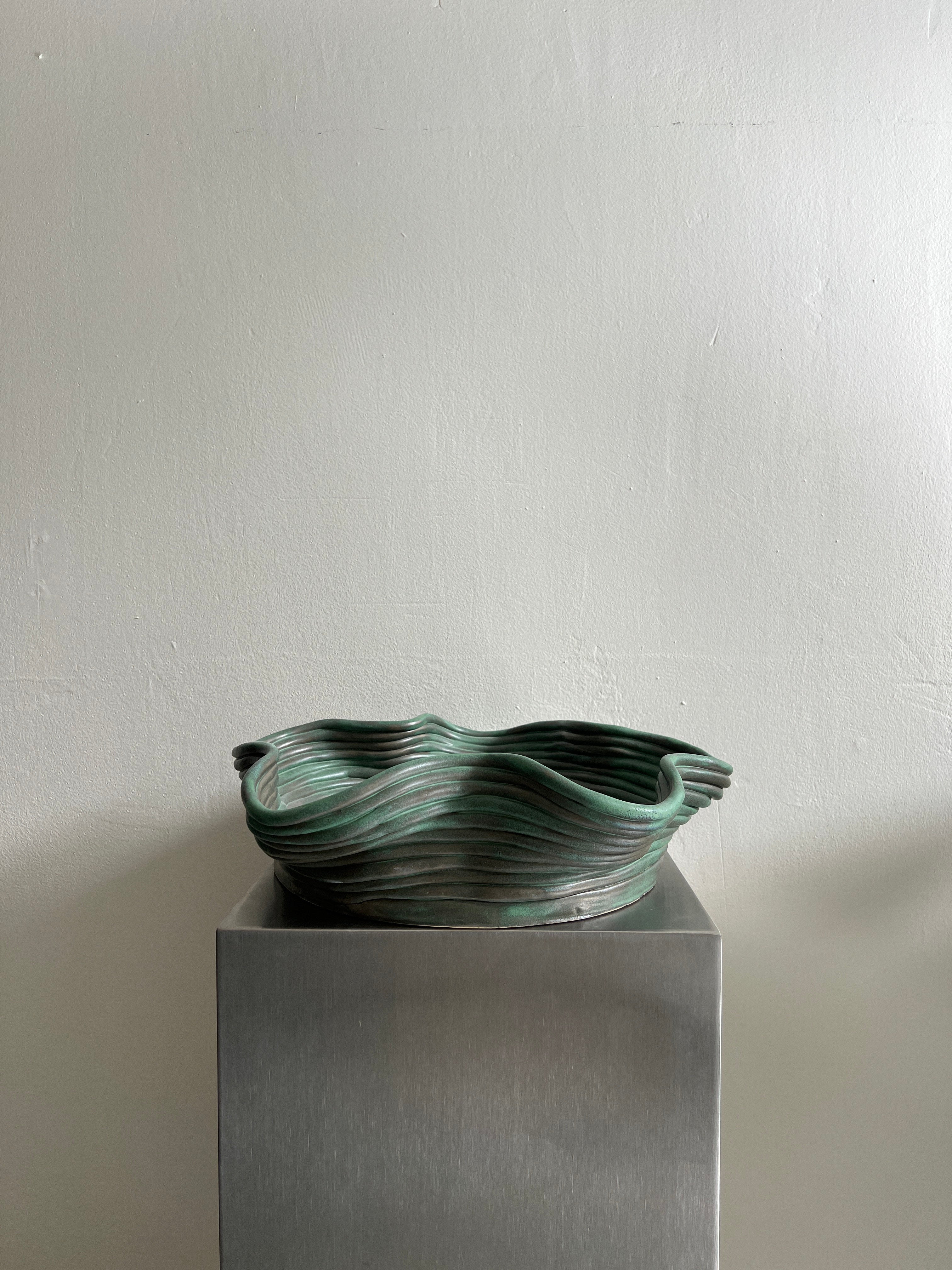 Handsculpted ceramic bowl dark green big — lifestyle setting