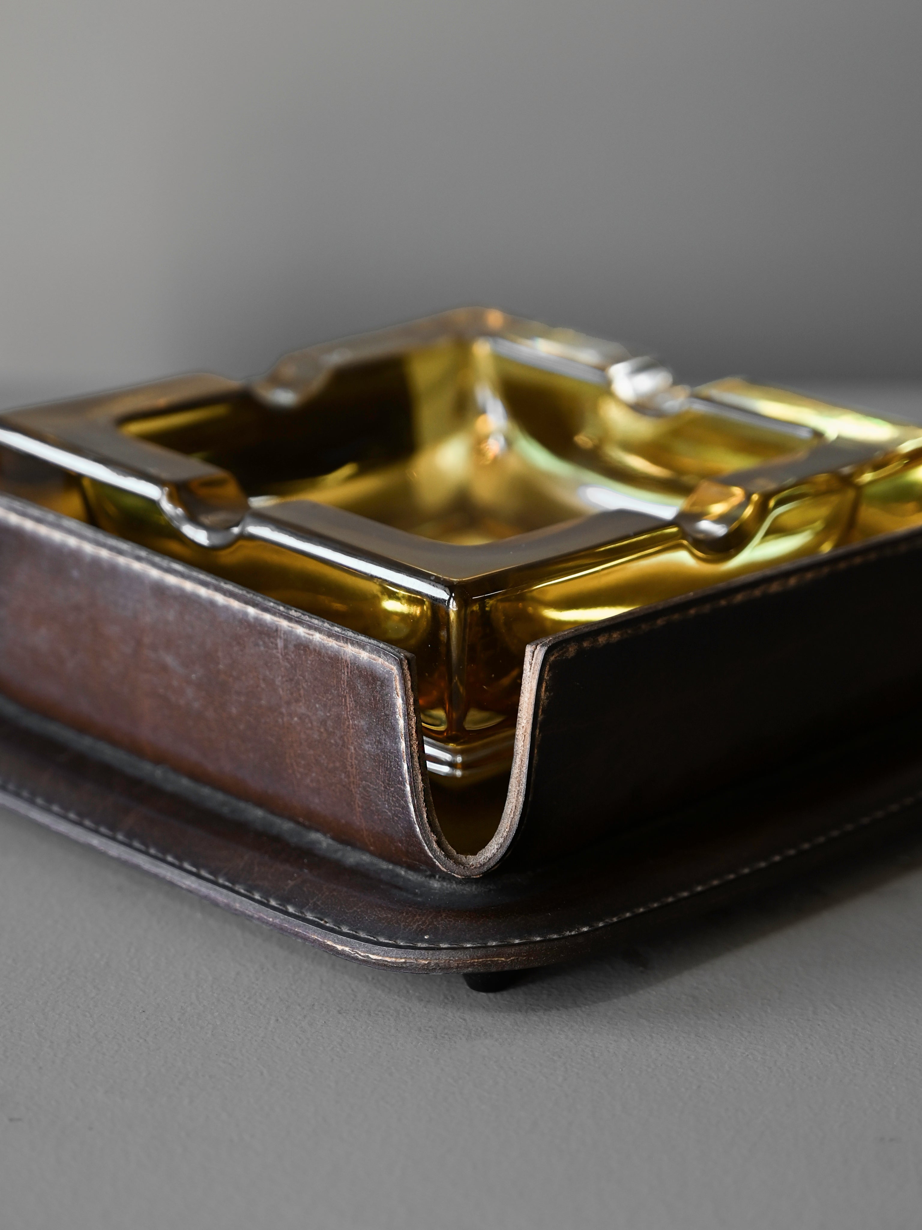 Cast-Glass and Leather Ashtray attributed to Jacques Adnet — close-up