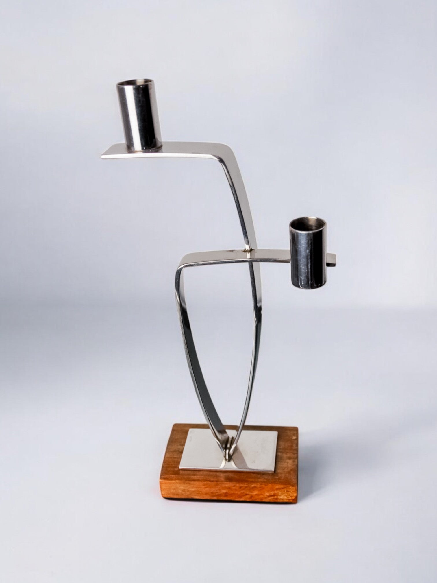 Candlestick in stainless steel and rosewood, 2 flames, Denmark, 1970's — lifestyle setting