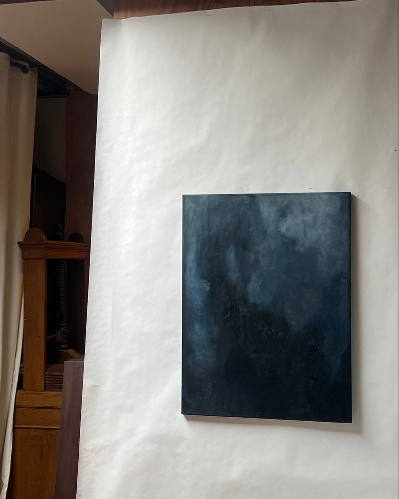 Oil Painting, Unfolding (2025) — close-up of dark textured canvas in studio