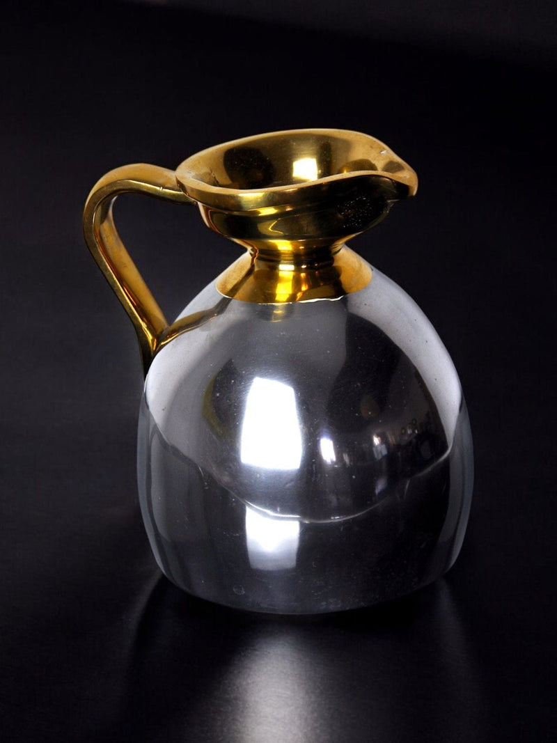 Brutalist Jar by Art3, Spain, 1980 — close-up of reflective silver body and gold handle