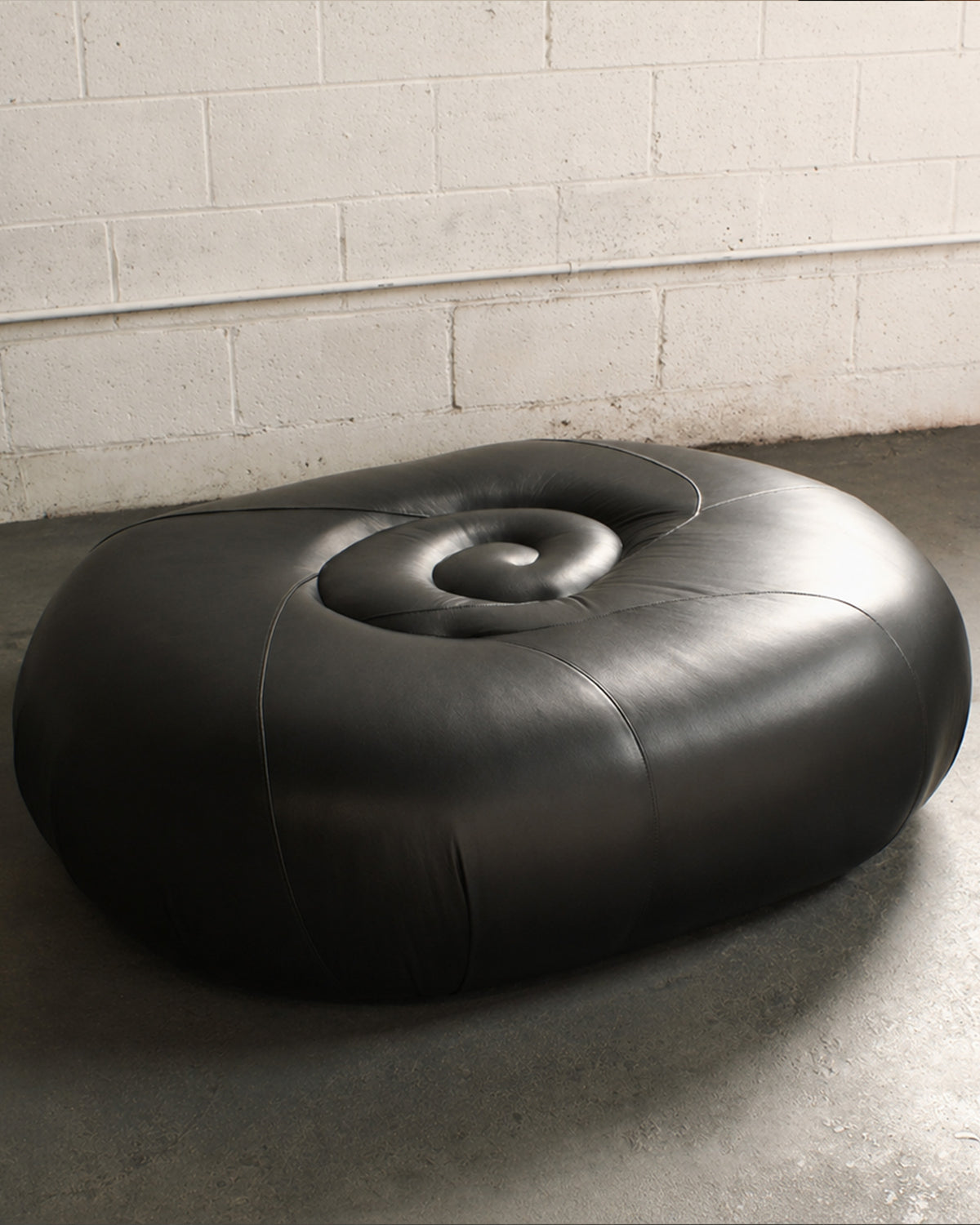 Volute Pouf — side angle