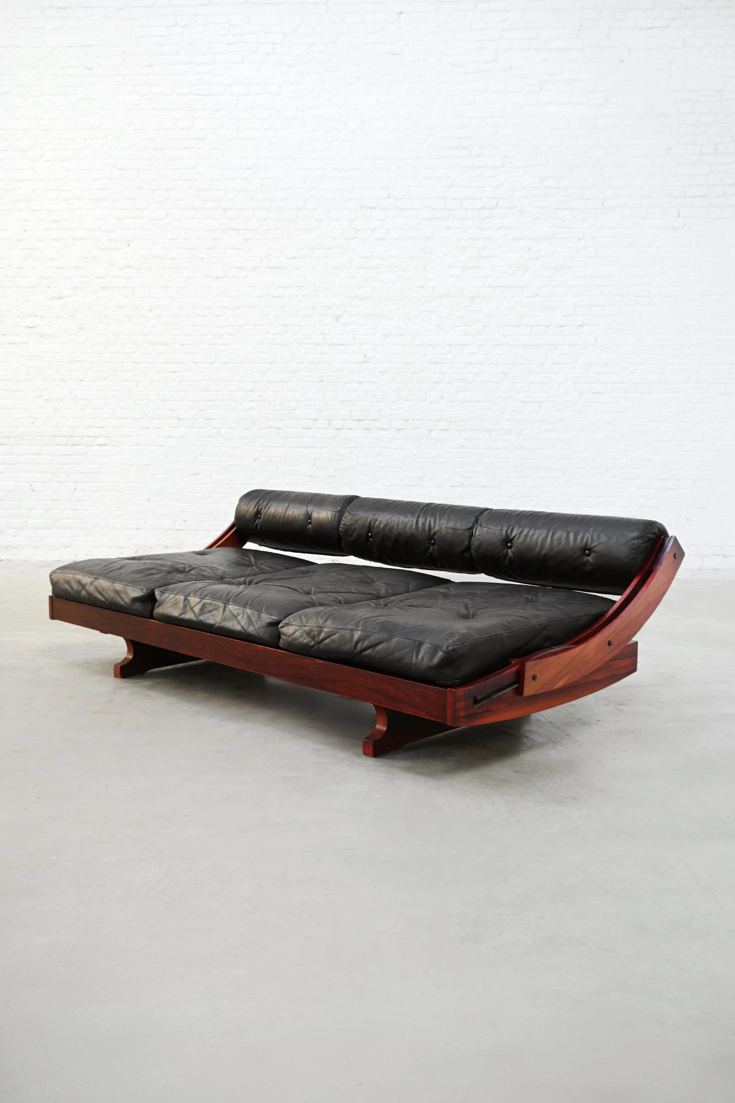 Gianni Songia GS195 Sofa / Daybed for Sormani — side angle with black leather upholstery