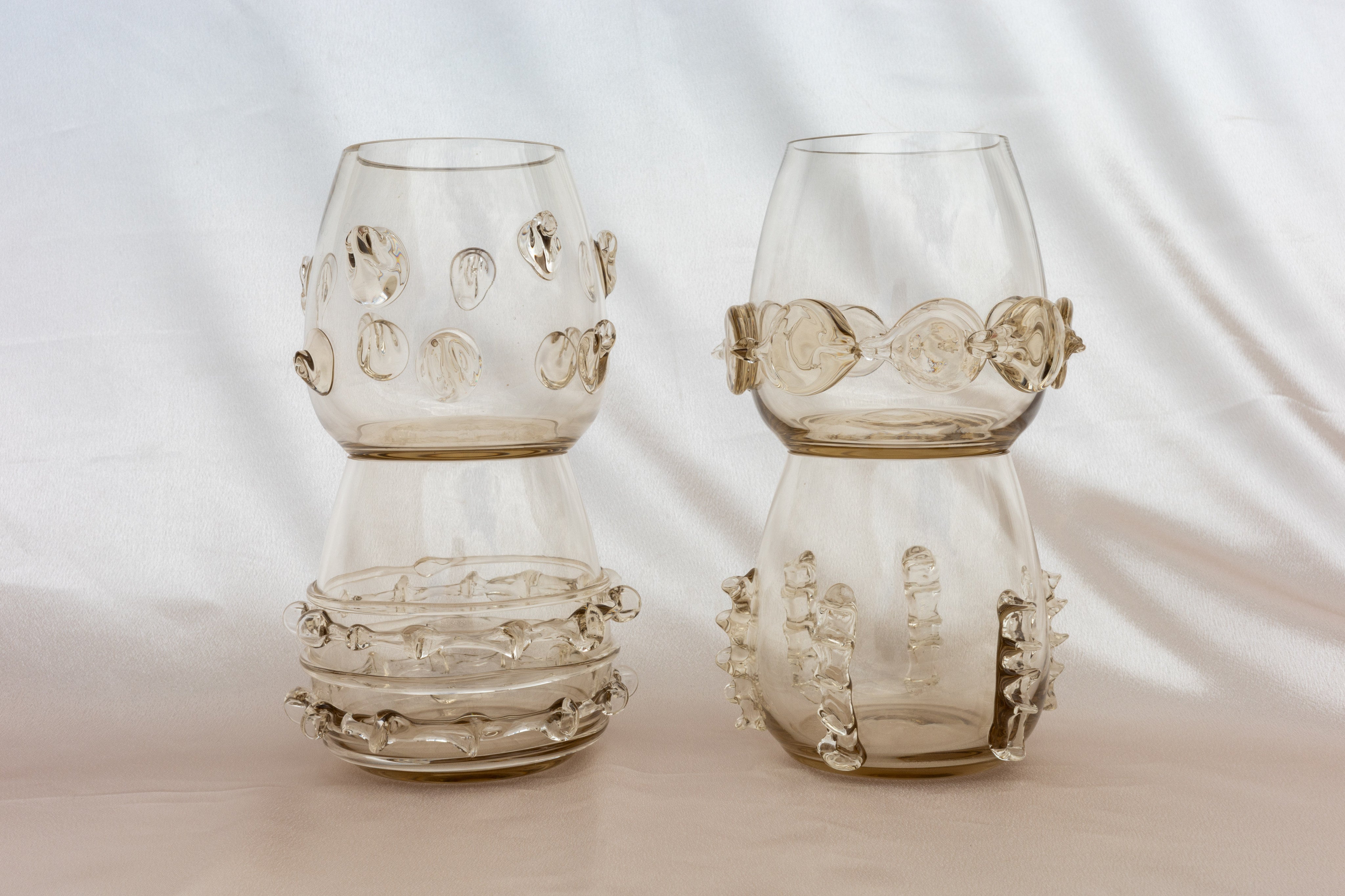 Contemporary Tumblr - Set of four handblown glass vessels — top view of stacked glass vessels