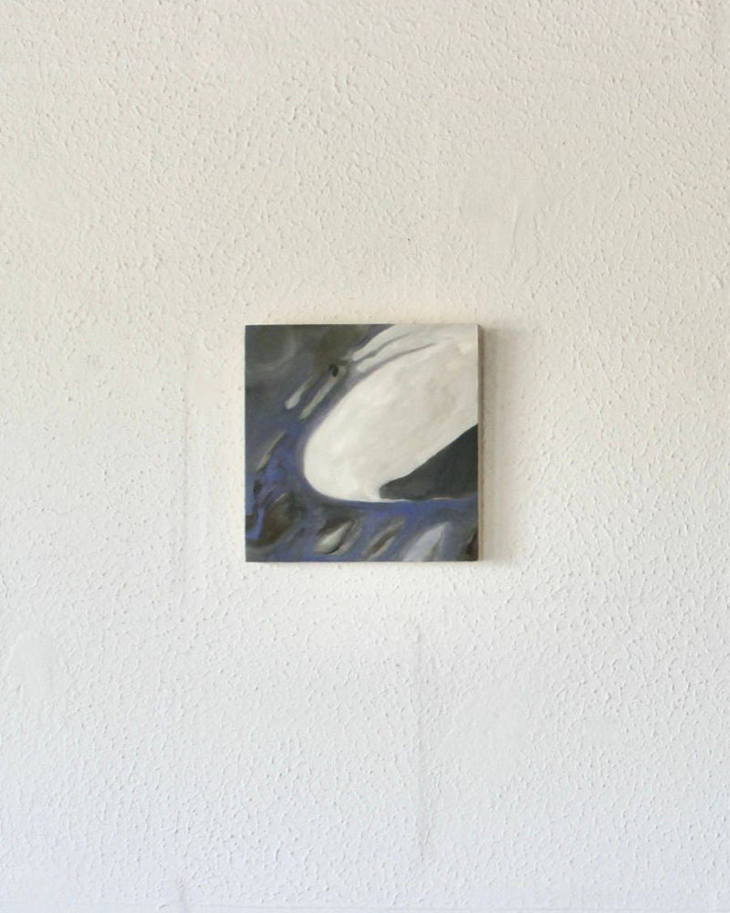 Abstract painting with flowing white and blue brushstrokes on canvas