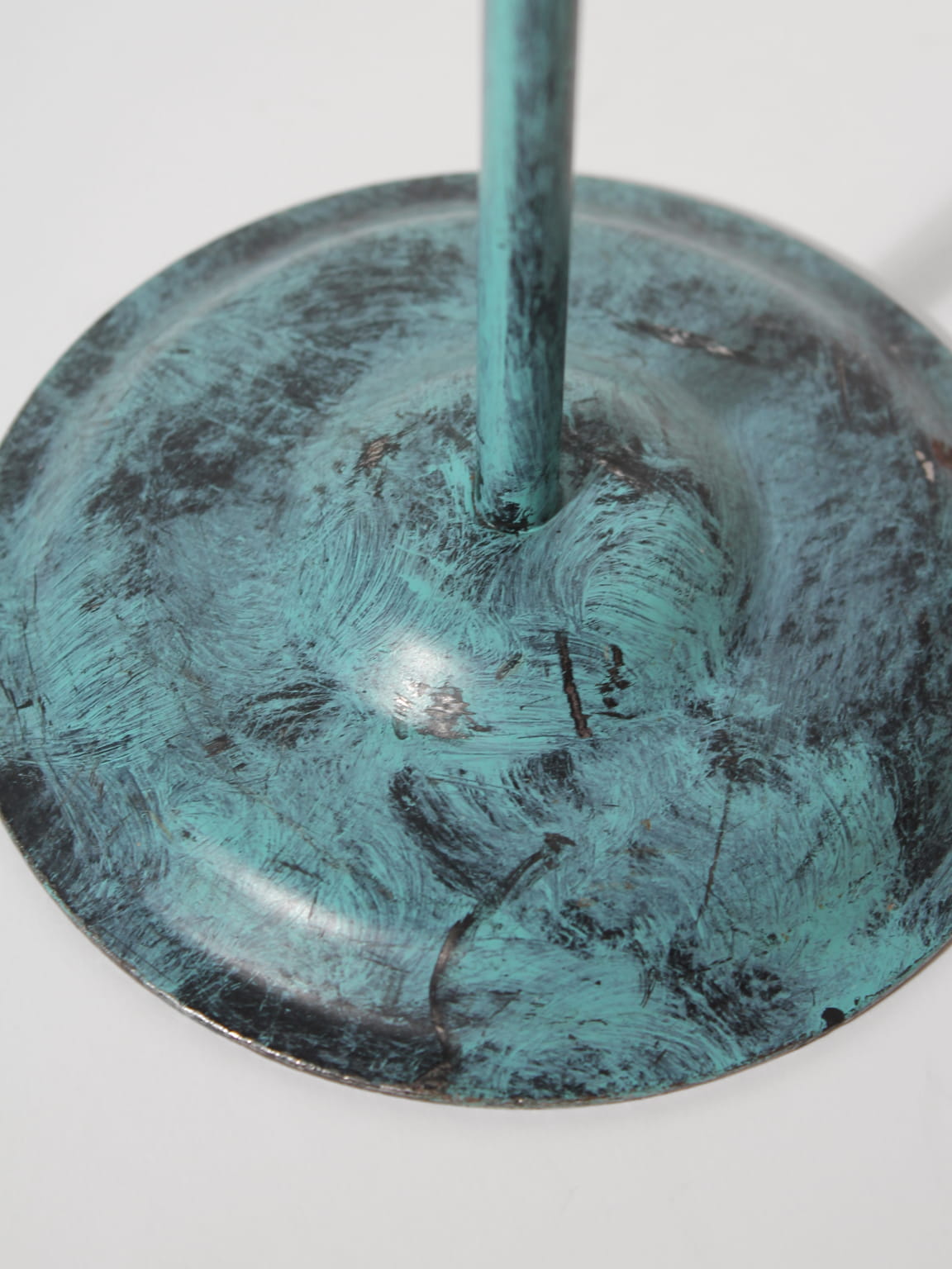 Turquoise Super Slim Floor Metal Candlestick — close-up of textured base
