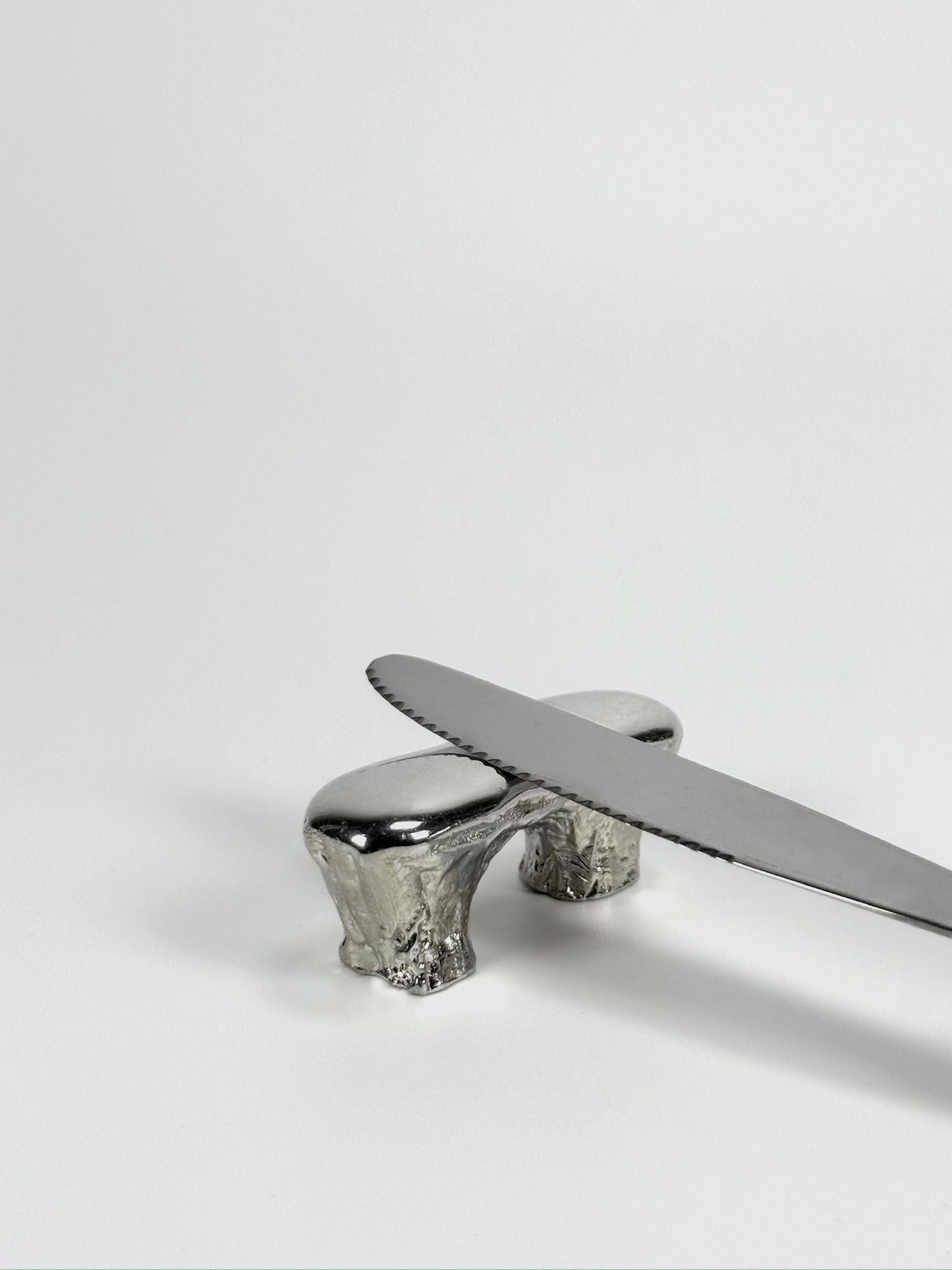 The Tin Collection / Breakfast Set — back view of silver knife rest