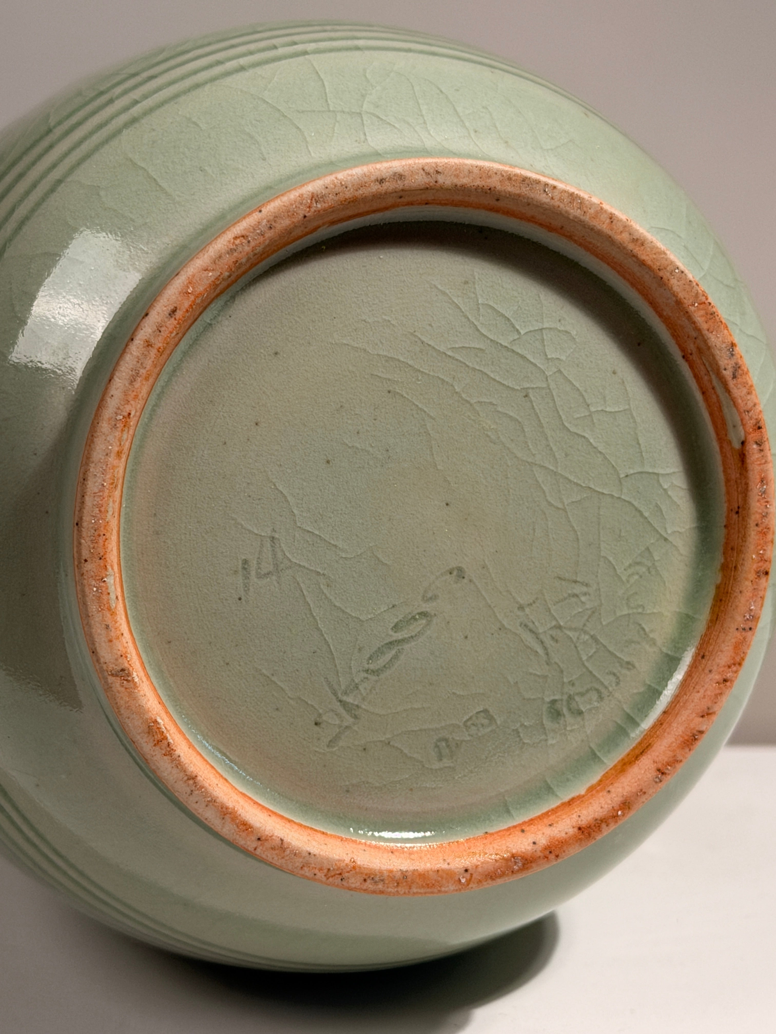 Art Deco celadon vase, France, circa 1920.  — lifestyle setting