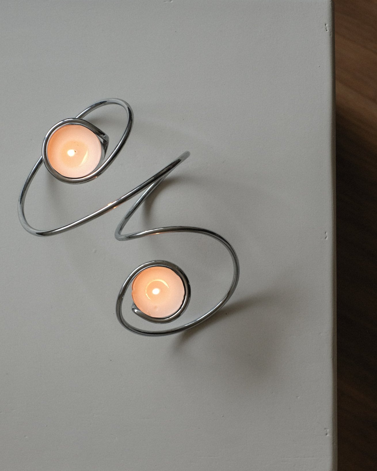 Chrome Candleholder — top view of polished chrome with candles