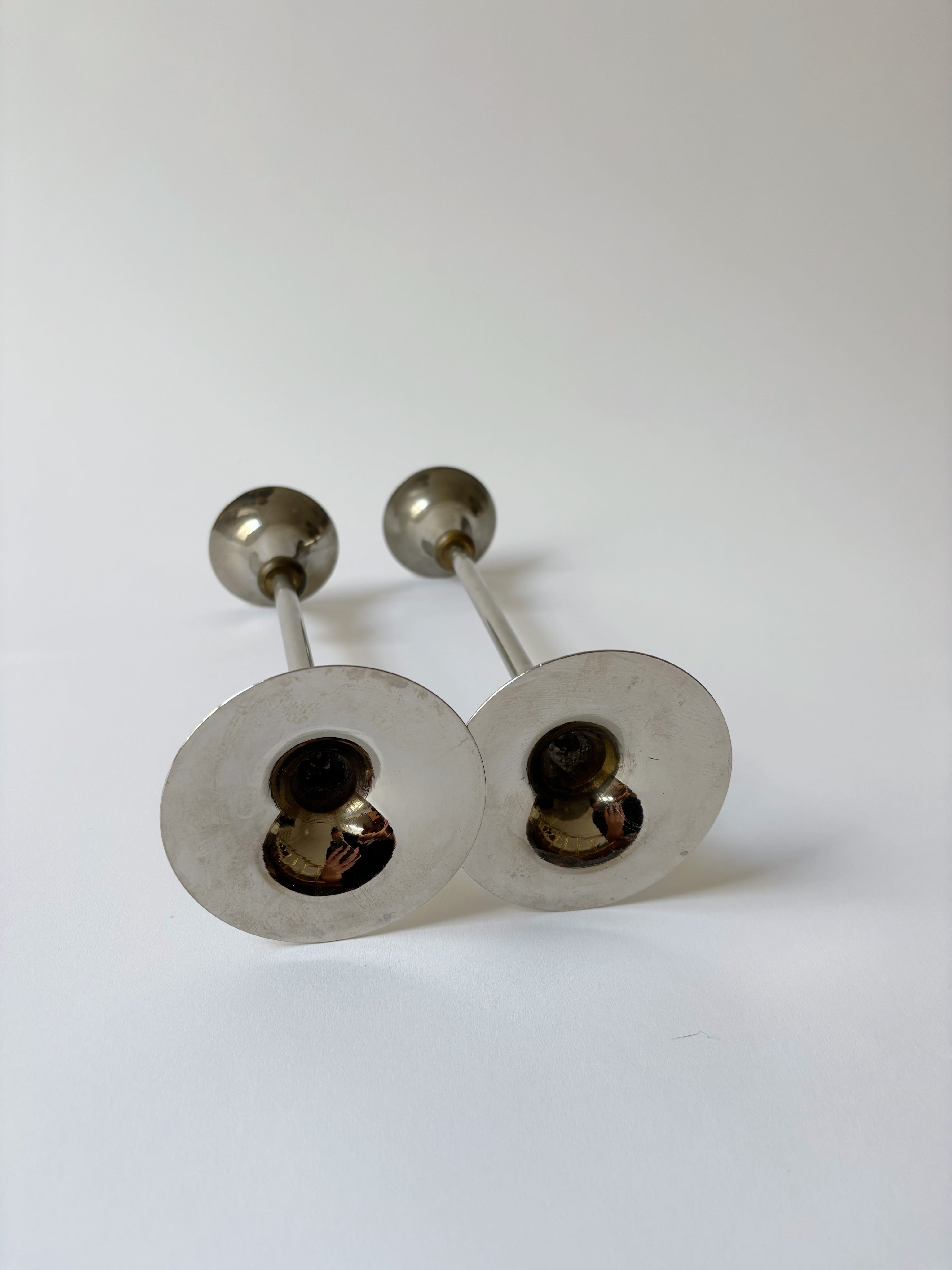 2 Metal Postmodern Candleholders — top view showing polished metal finish
