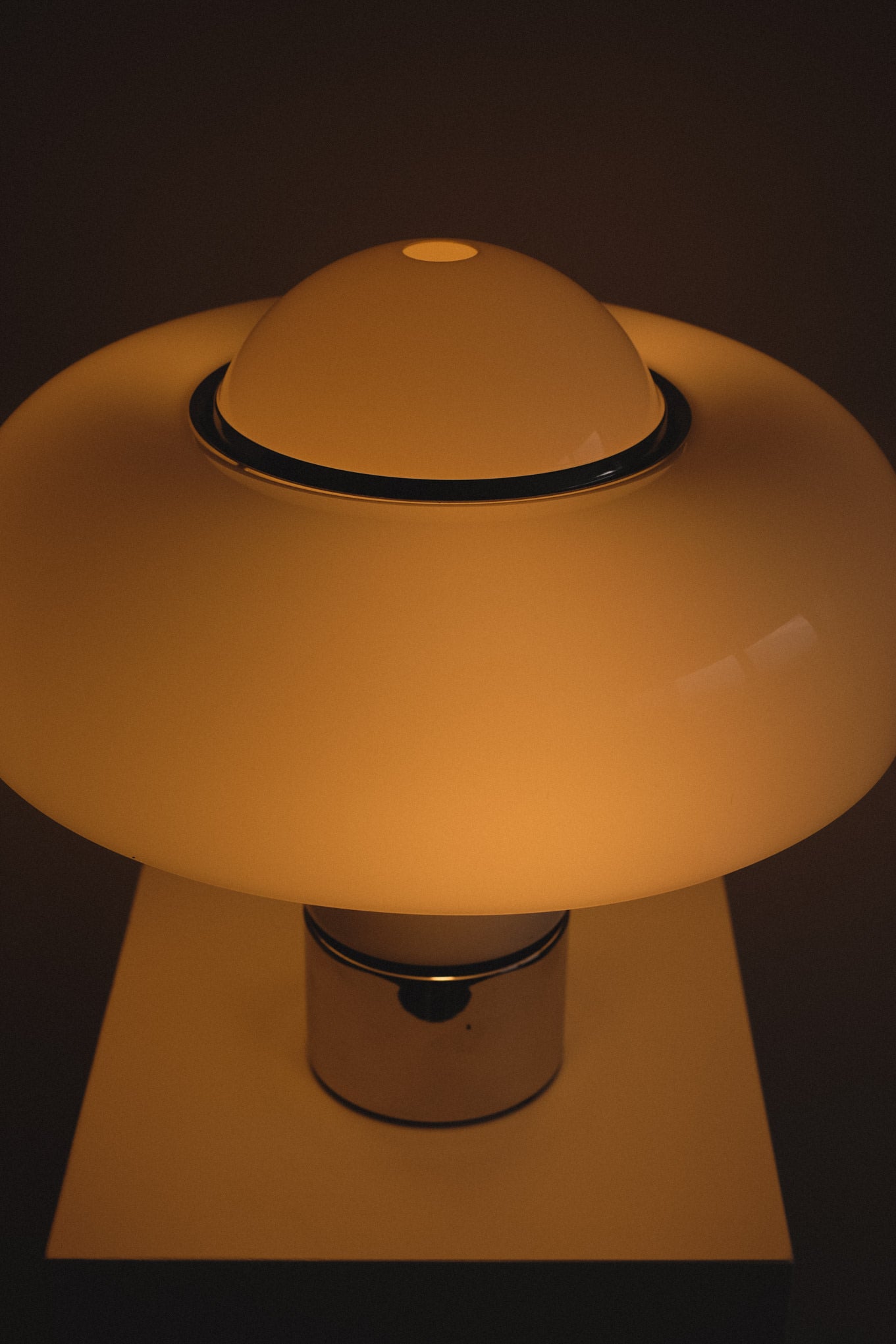 Brumbry Table Lamp by Luigi Massoni for Harvey Guzzini — close-up of glowing glass shade