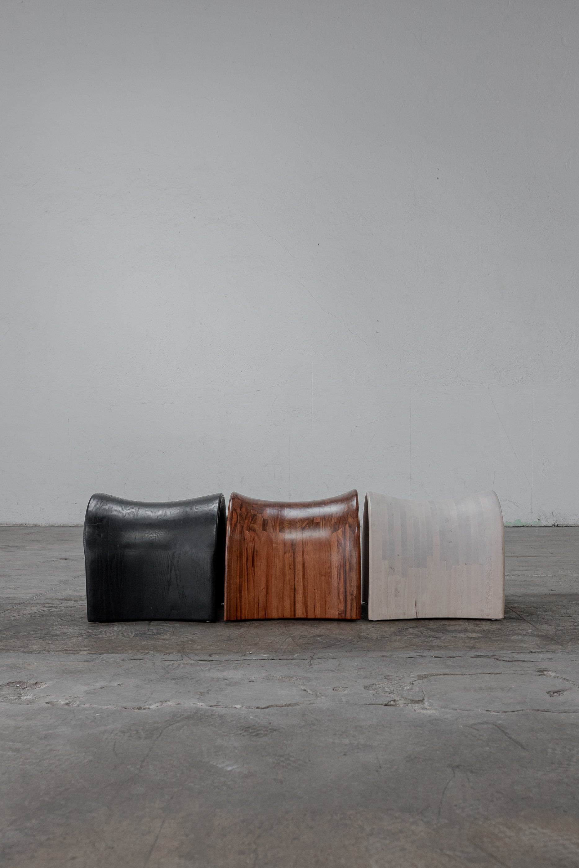TORO Oak Stool — top view of three wooden stools in varying finishes