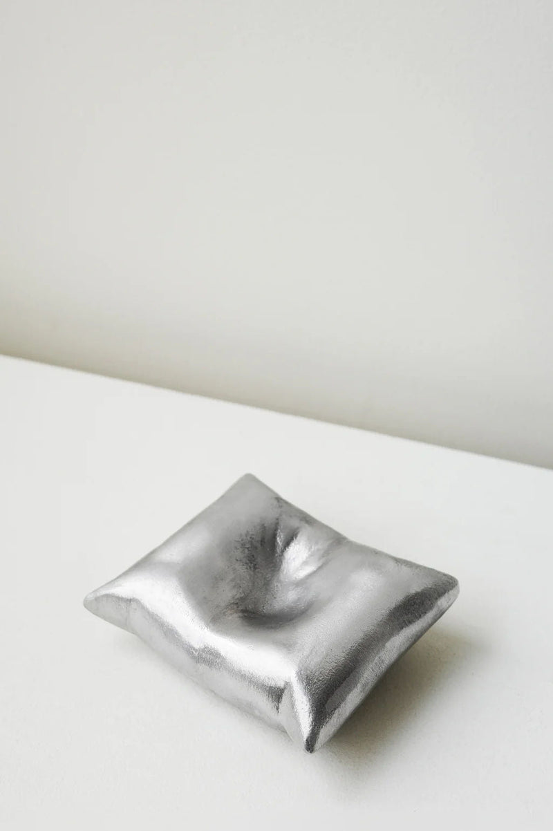 Bumped - Aluminium Cushion in Silver by Completedworks | The Oblist
