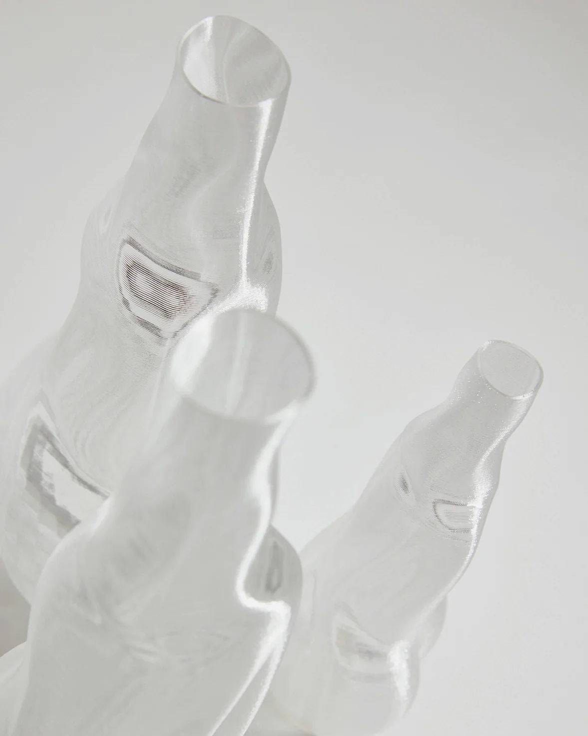 Éson Vessel — side angle of clear glass vases