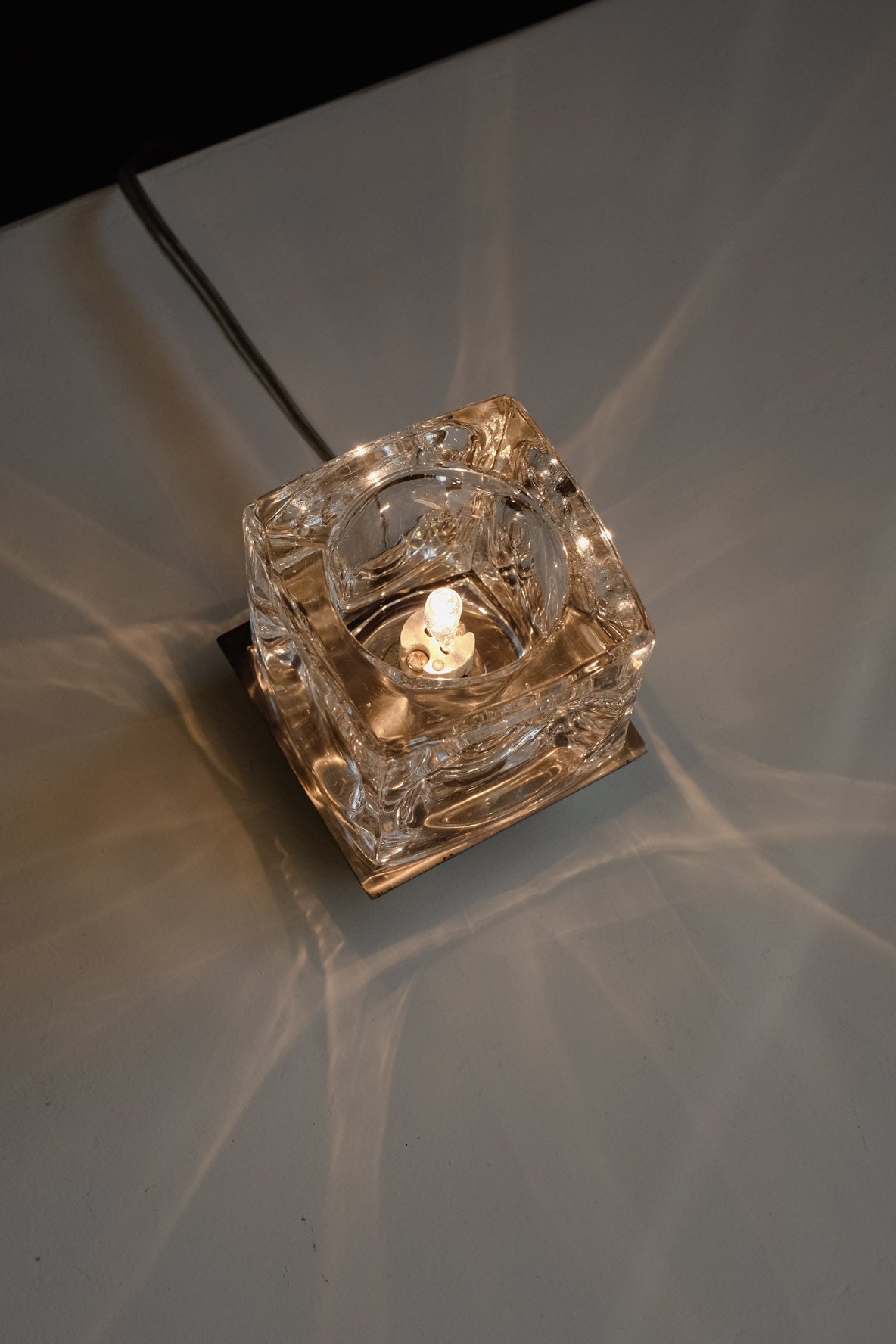Ice Cube' Table Lamp — top view showing glass design and light reflections