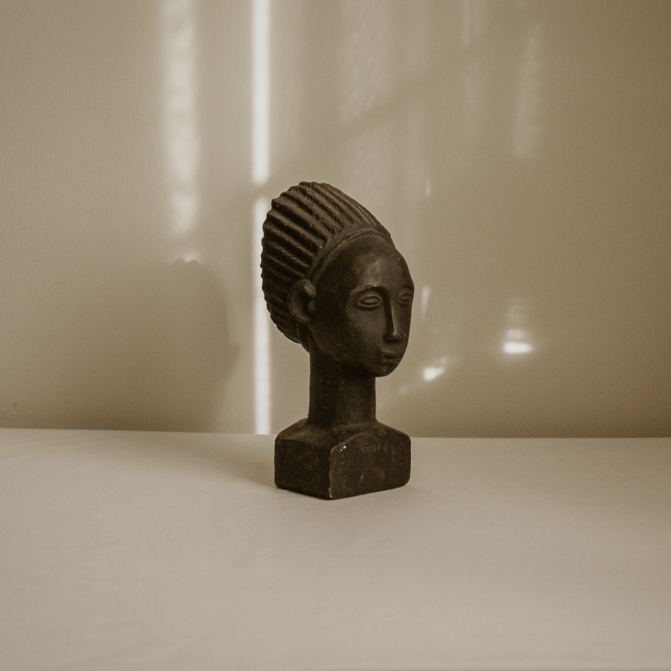 African Terracotta Bust — lifestyle setting