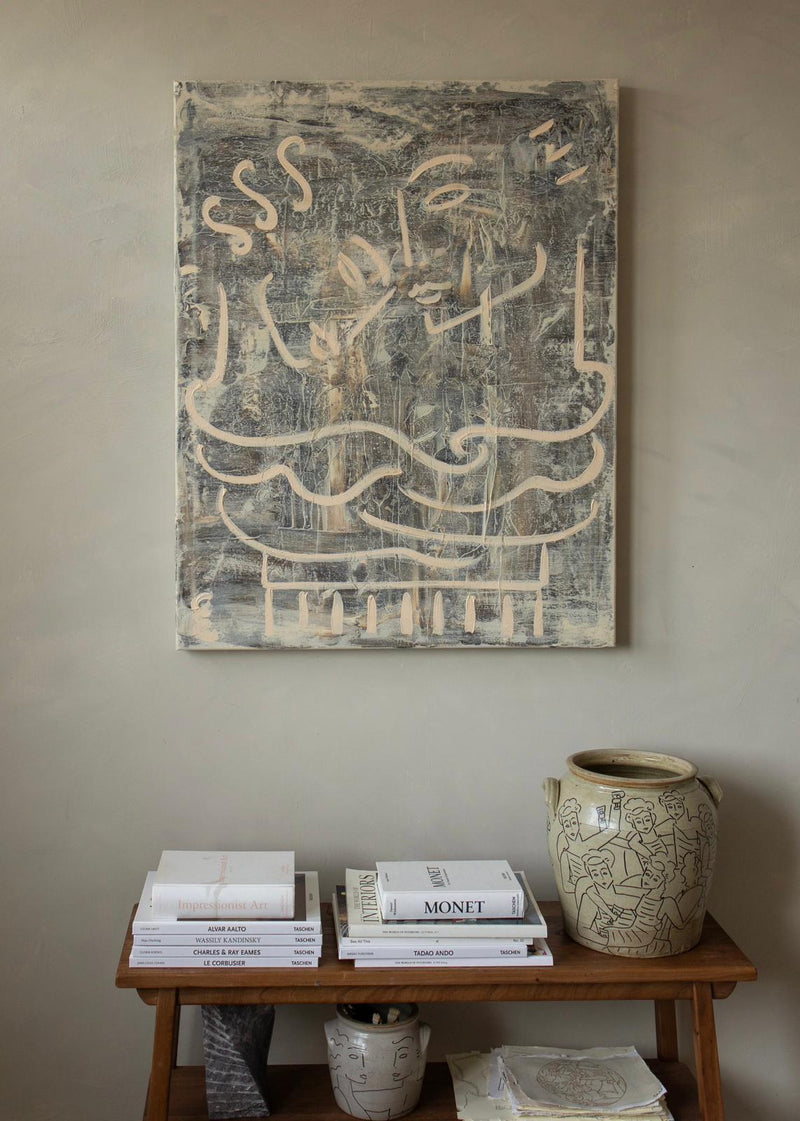 Le Big Hug — close-up of painted canvas on textured wall