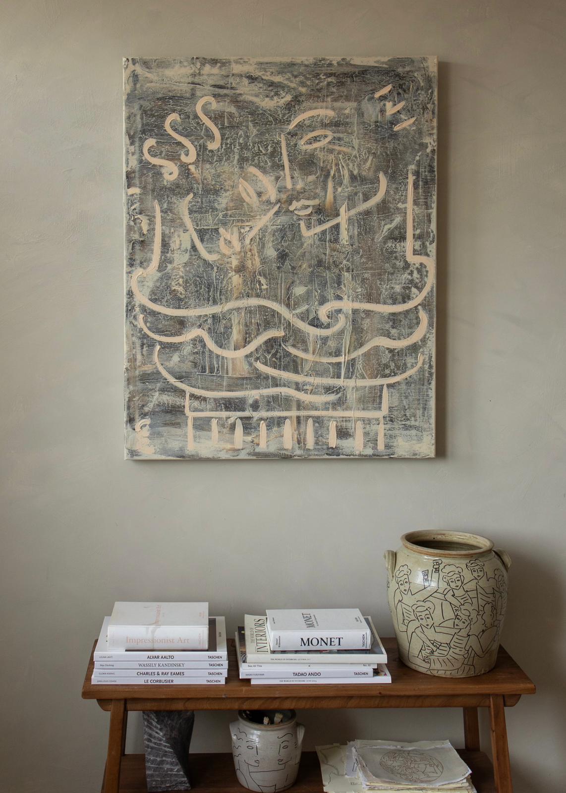 Le Big Hug — close-up of painted canvas on textured wall