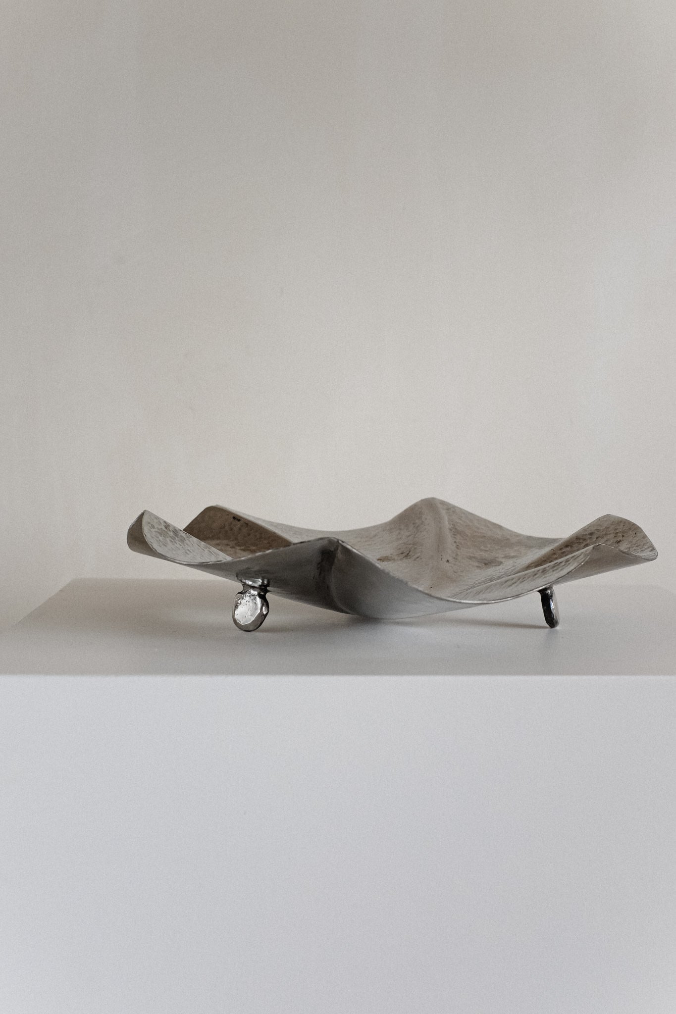 Decorative Footed Bowl — angled view on white pedestal