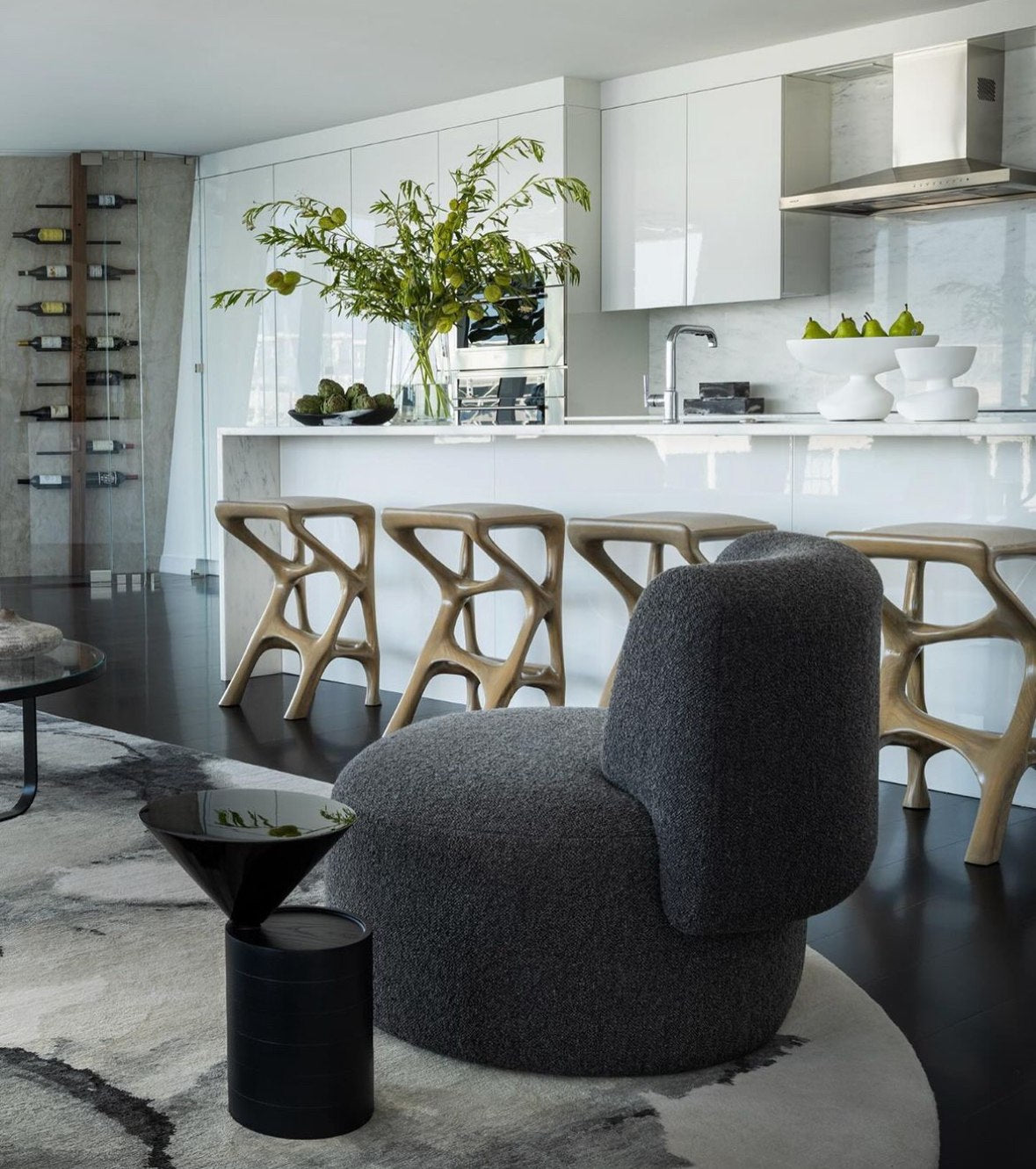Sculptural Chimera Stool in Ash Wood with Upholstery — lifestyle setting