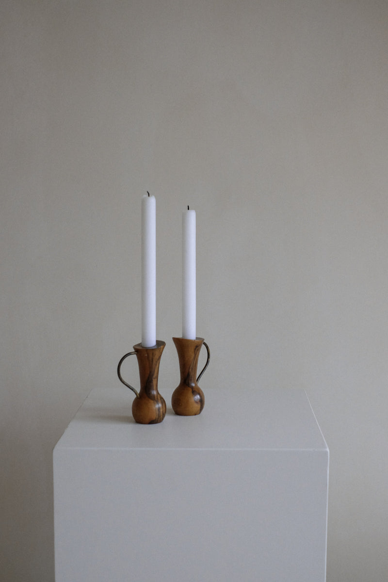 Pair of Wooden Candle Holders — close-up on light wooden texture