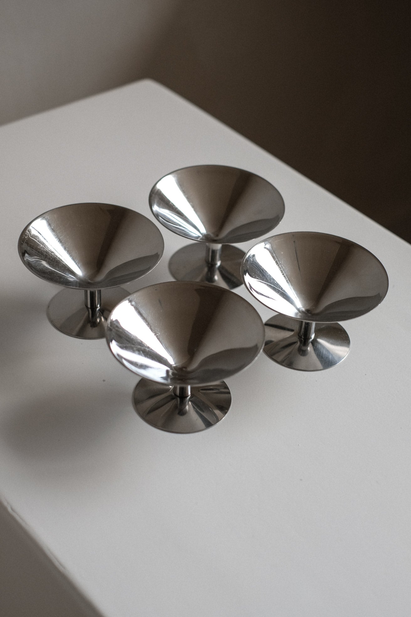 Set of Four Ice Coupes — angled view on white surface
