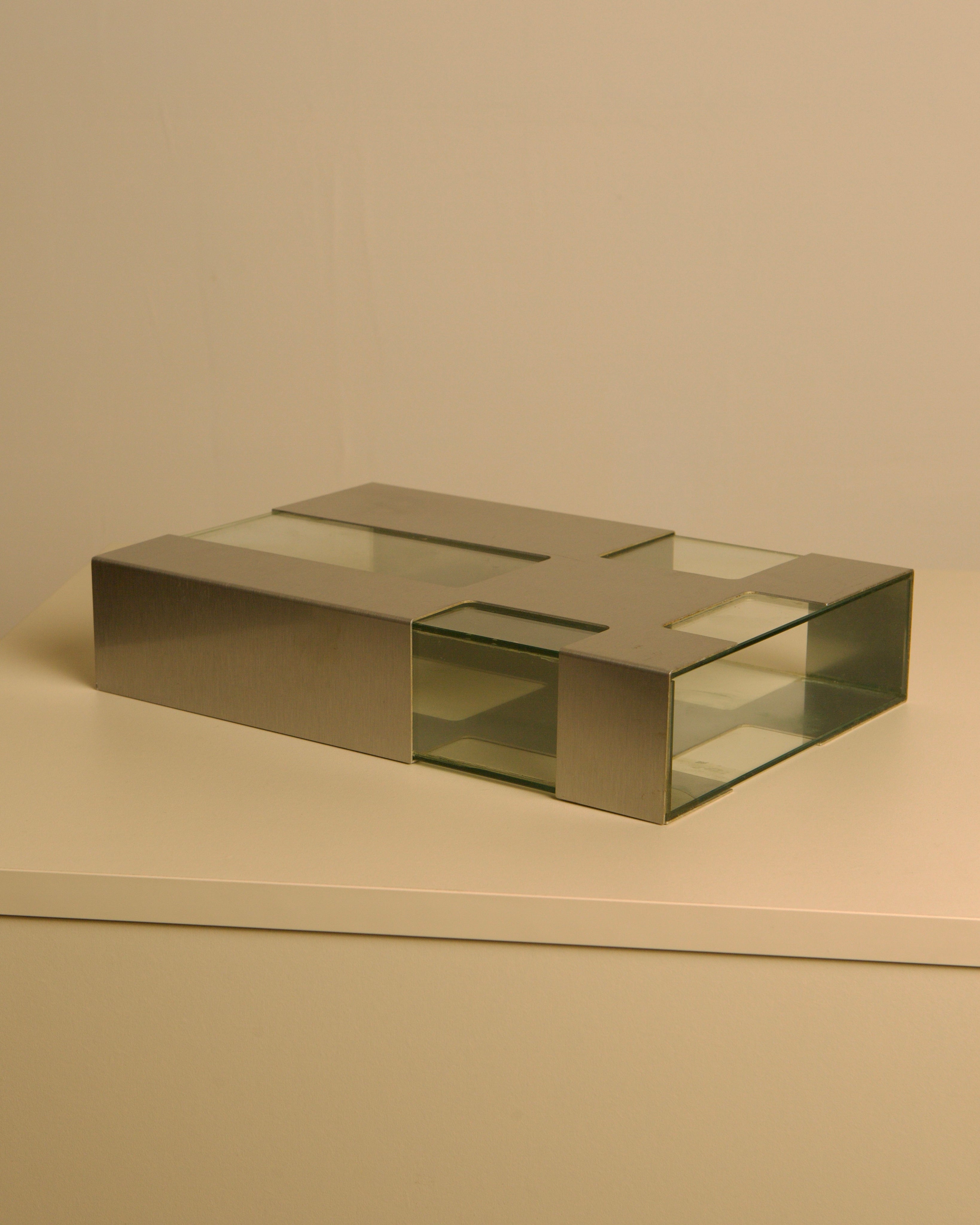 Italian Vase in Metal and Glass c. 1980 — top view showing rectangular design on white surface