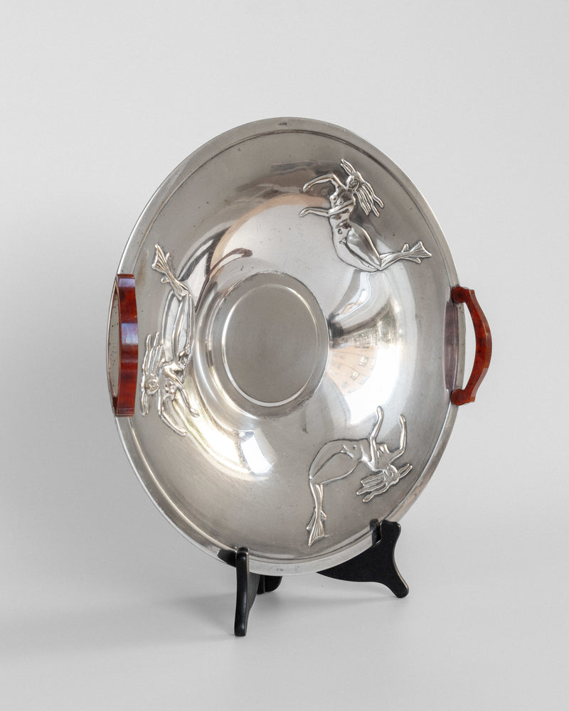 Art Deco silver dish with engraved mermaids, red handles detail