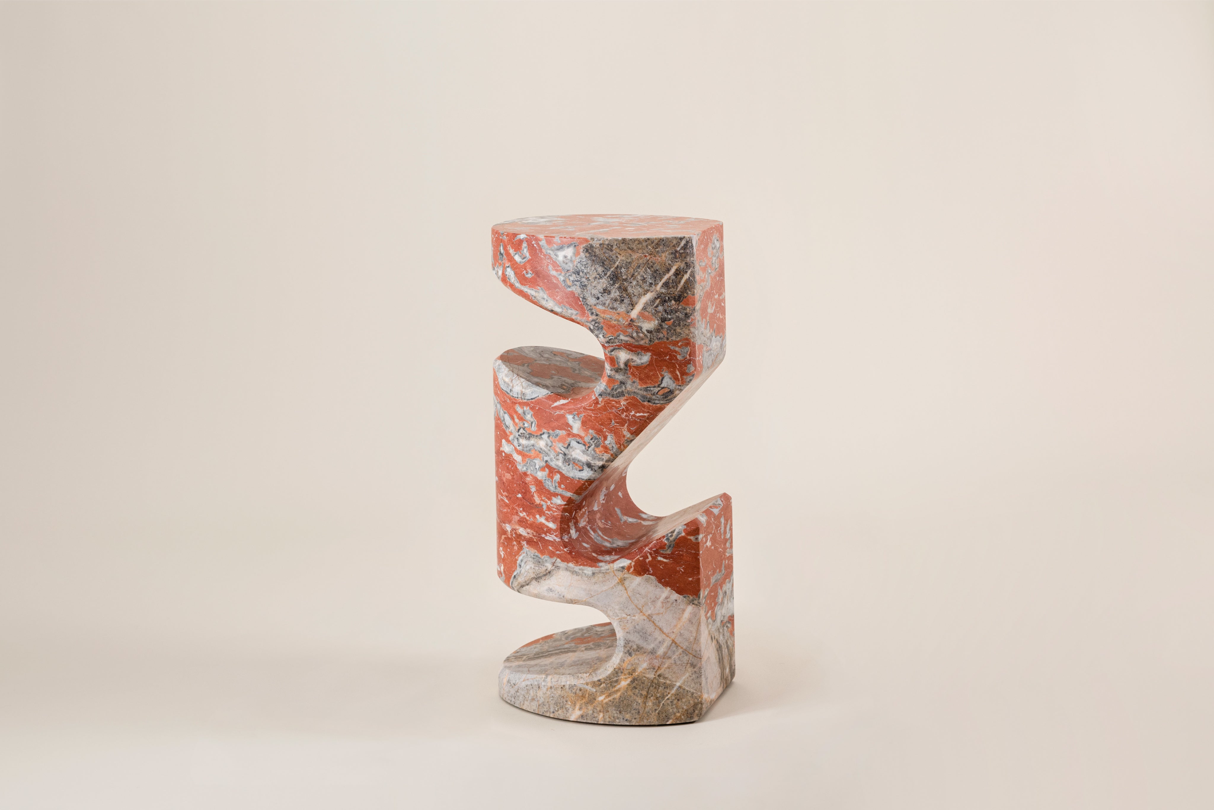 Tobo Side Table — angled view highlighting red marble finish