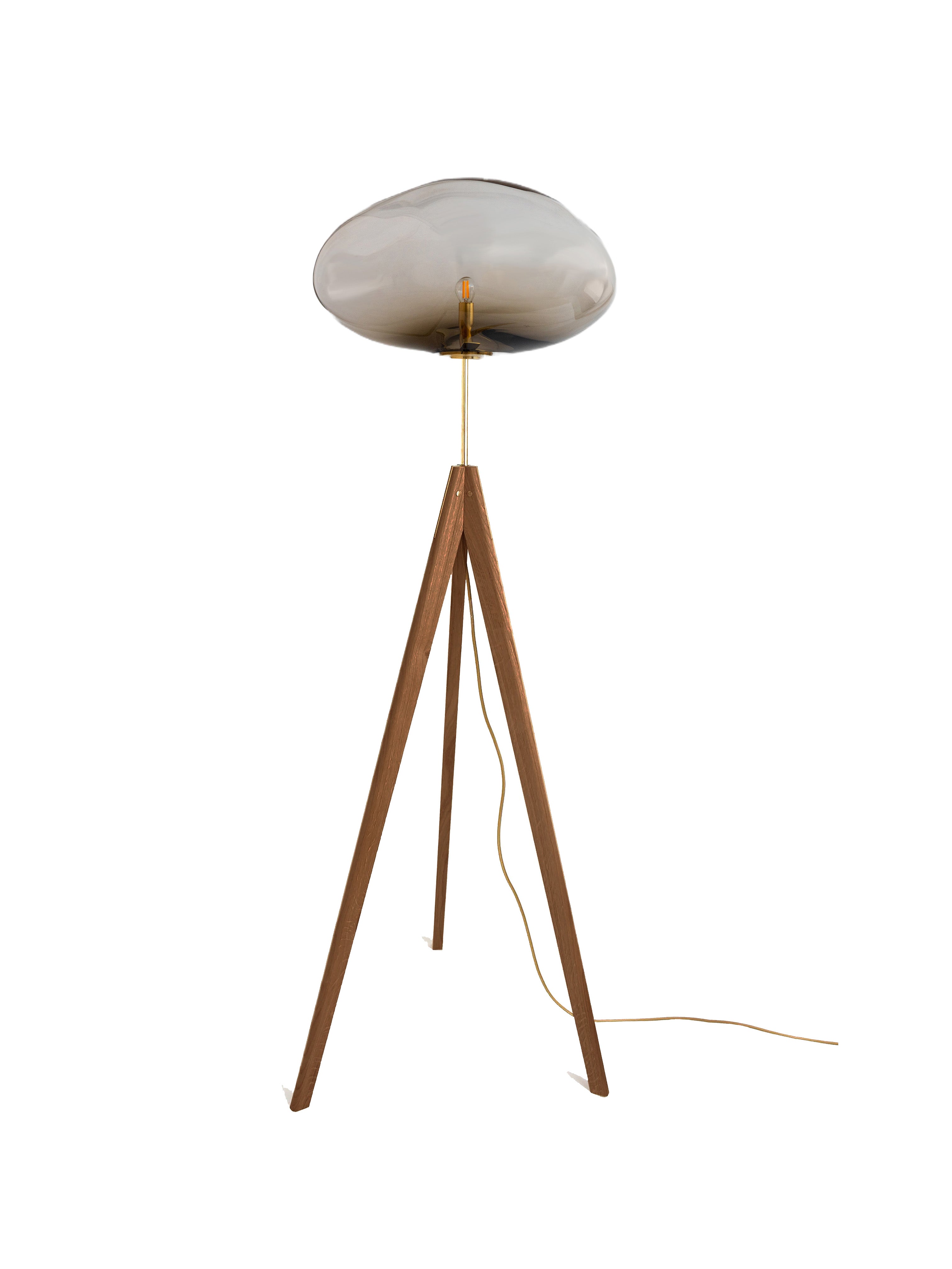 STATIX Floor Lamp — top view of wooden tripod legs and glass shade