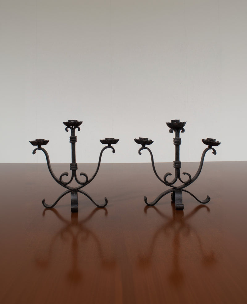 Pair of Brutalist Iron Candleholders with Sculptural Scroll Arms by Malata Antwerp | The Oblist