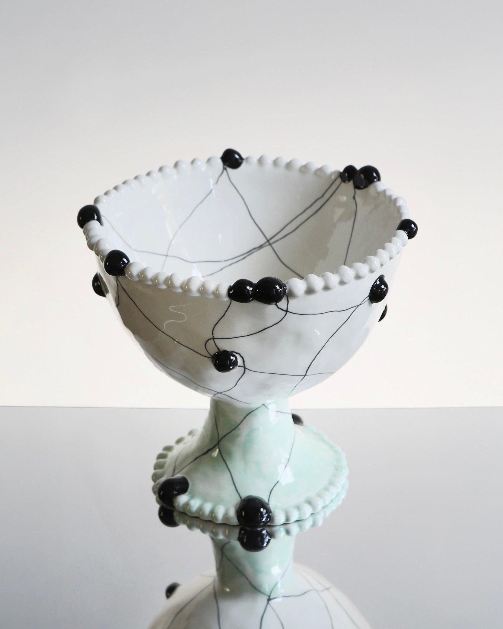 Large Wish Bowl — close-up of white ceramic with black accents