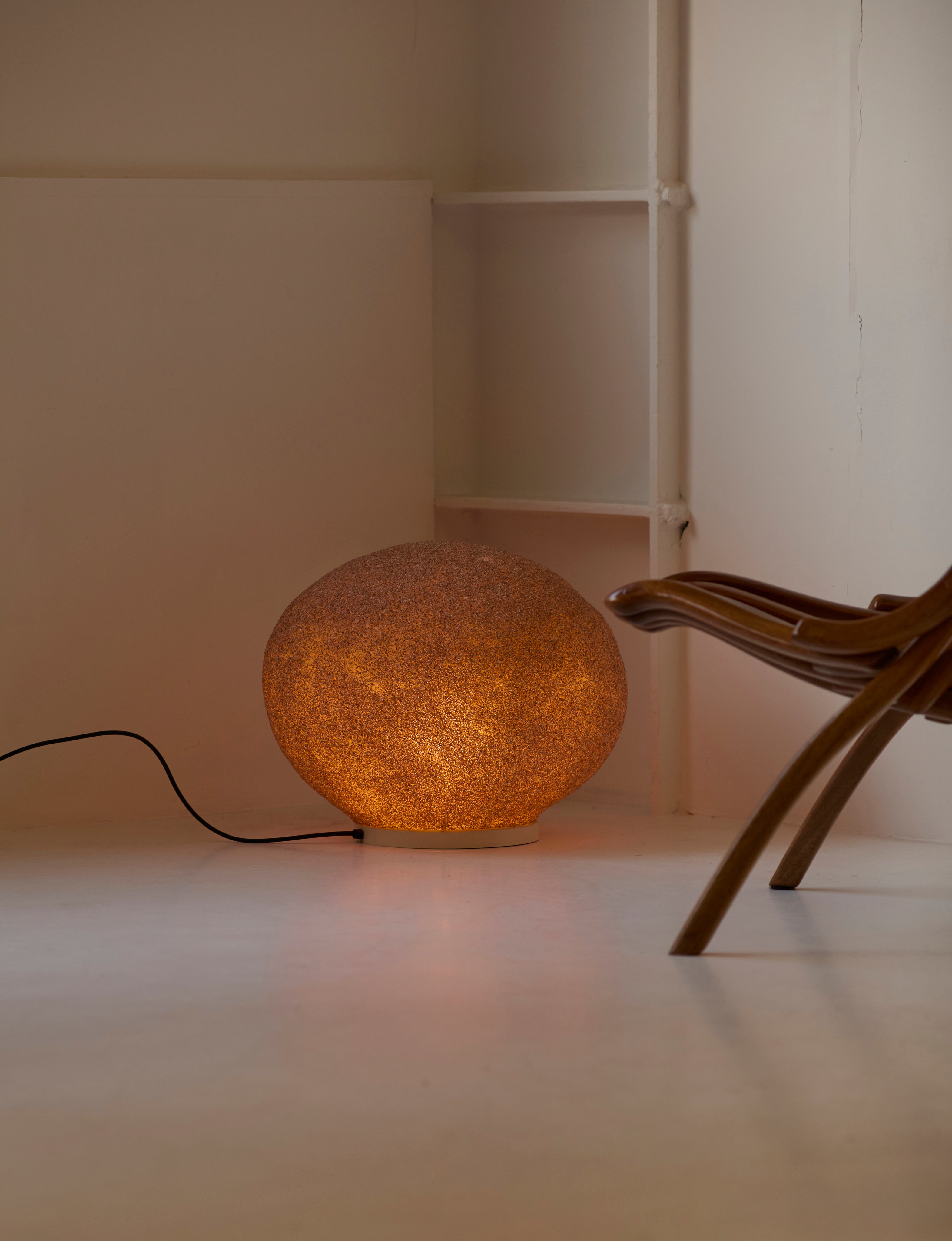 Vintage Floor Lamp in Fiberglass - Extra Large Moon Rock Collection c.1970 — illuminated in minimalist room setting