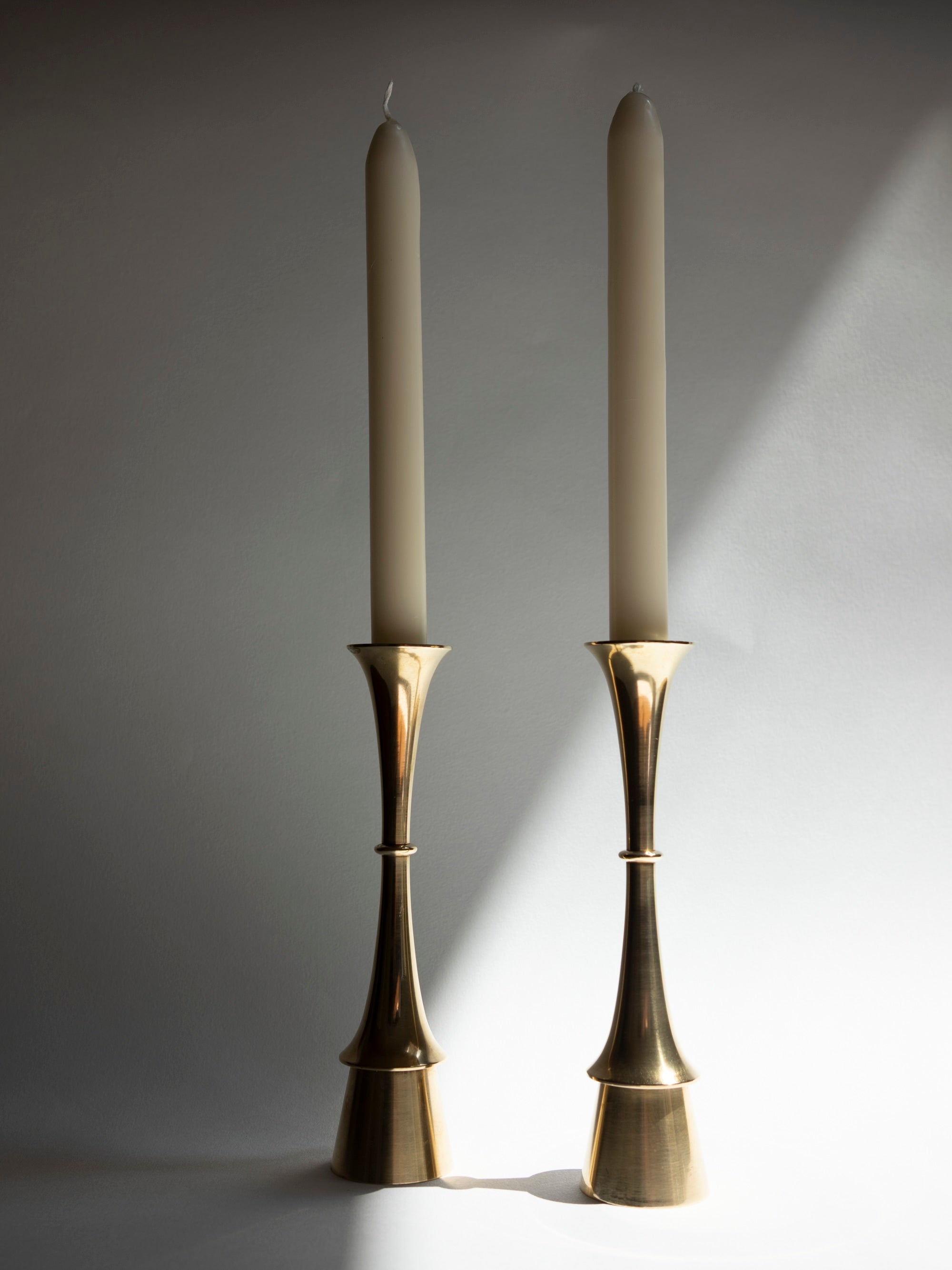 Pair of Fluid Form Danish Modern Solid Brass Candlesticks | c. 1960s — detail view