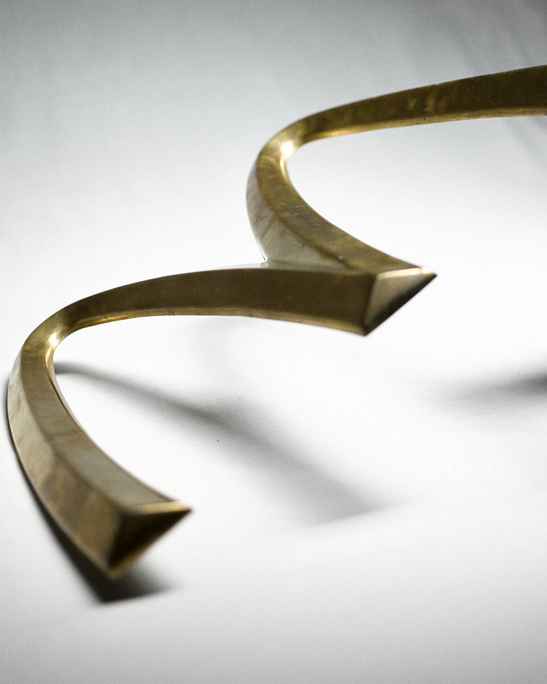 Vintage Italian McDonalds Sign in Brass — top view highlighting polished brass curves