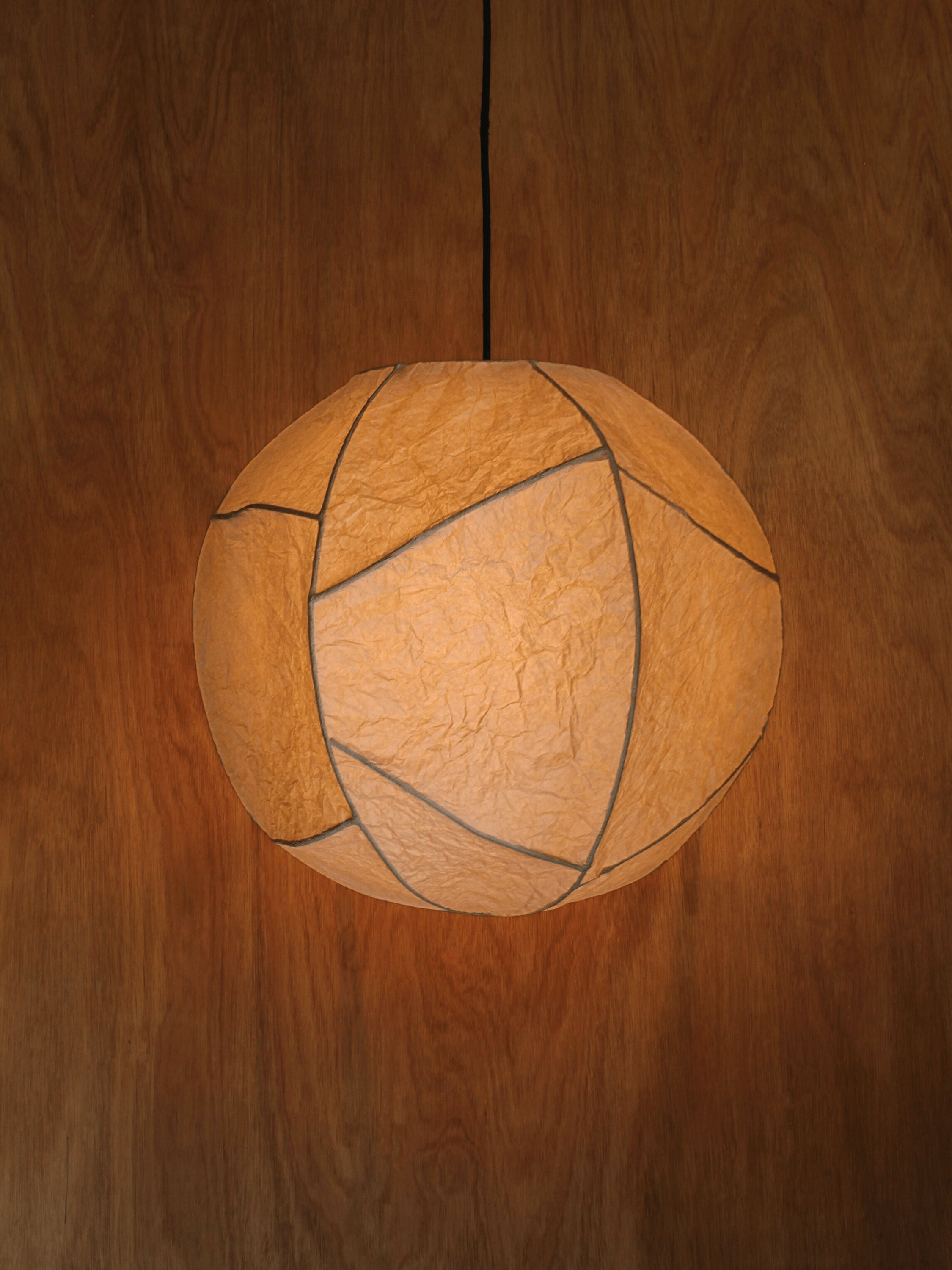 Sol' Pendant Light by Findere | The Oblist — handmade paper, warm amber color