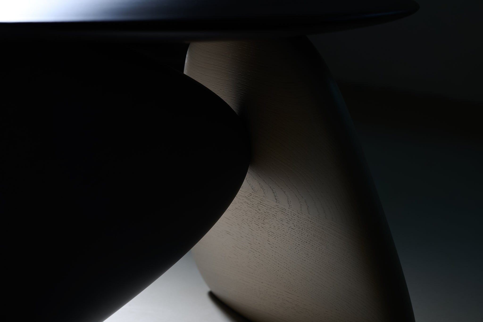 Kies' Coffee Table — side angle showing wooden leg detail