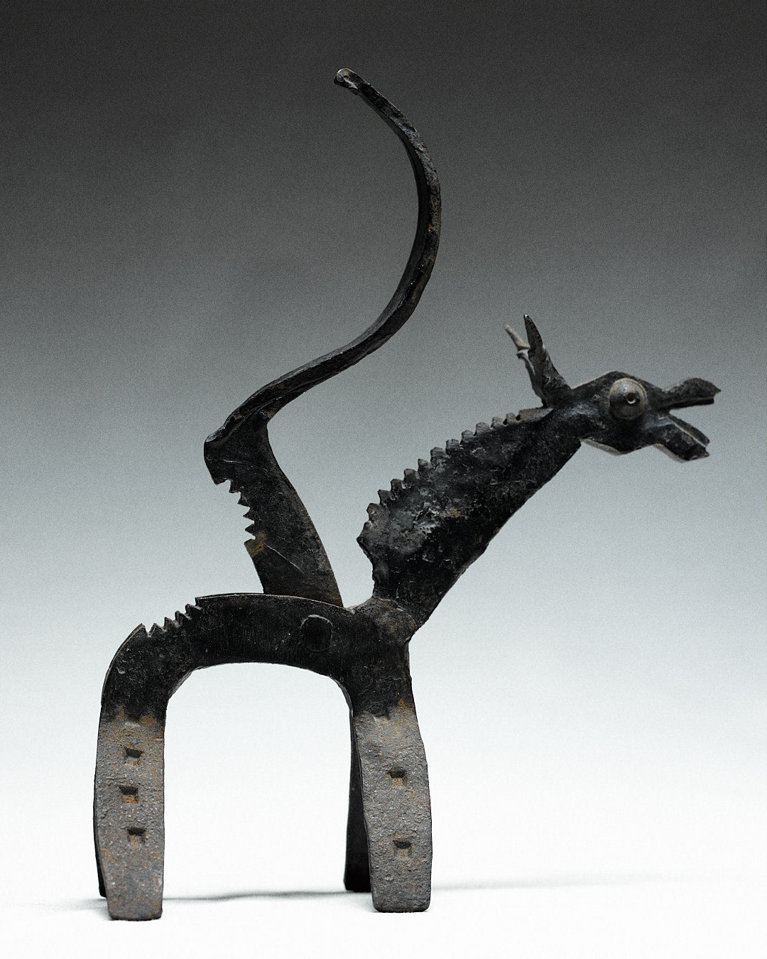 brutalist nutcracker, donkey — back view highlighting textured metal design