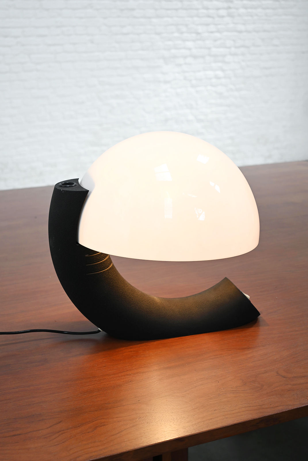 Italian Concordia table lamp with illuminated dome on curved base
